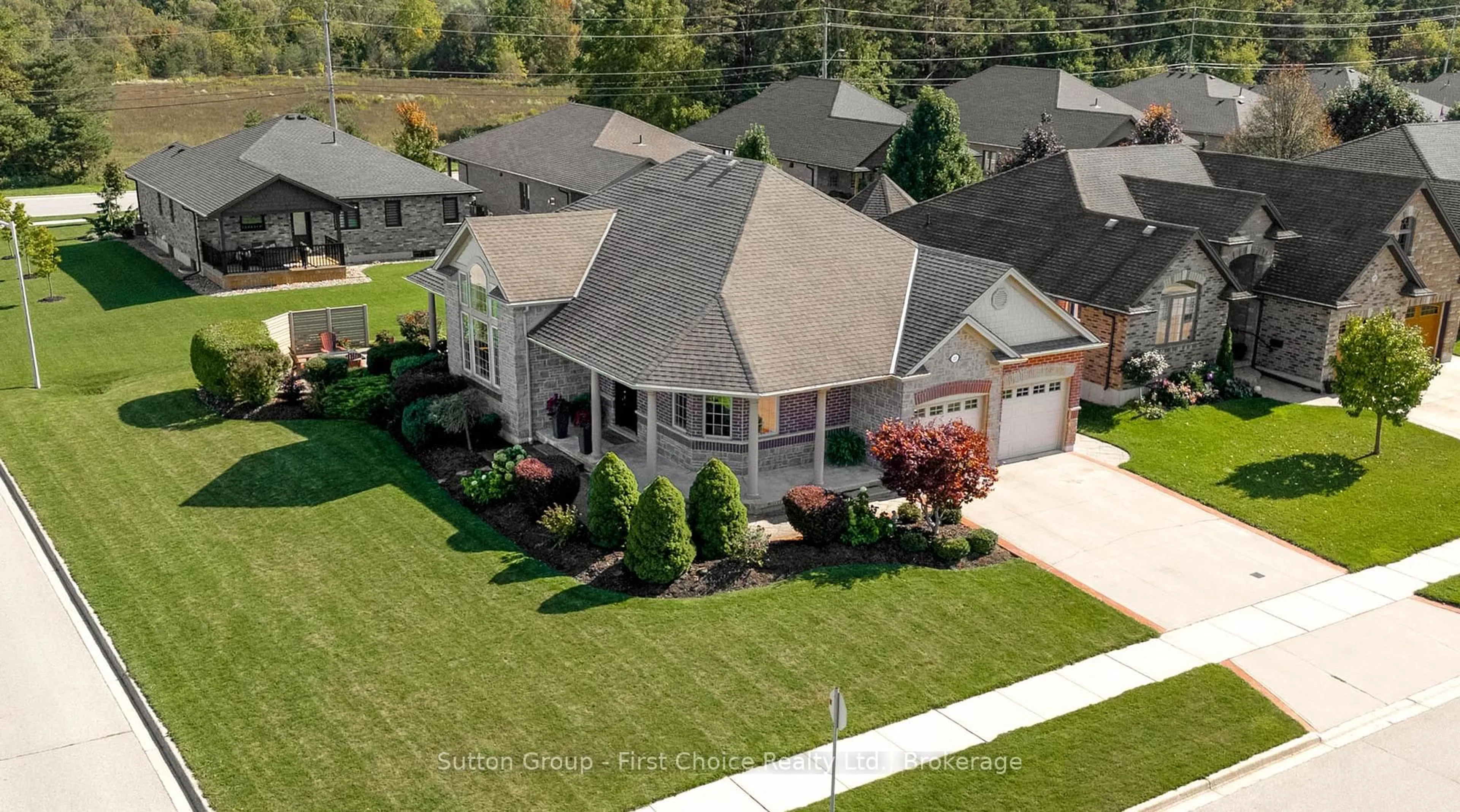 A pic from outside/outdoor area/front of a property/back of a property/a pic from drone, street for 211 Sunset Dr, West Perth Ontario N0K 1W0