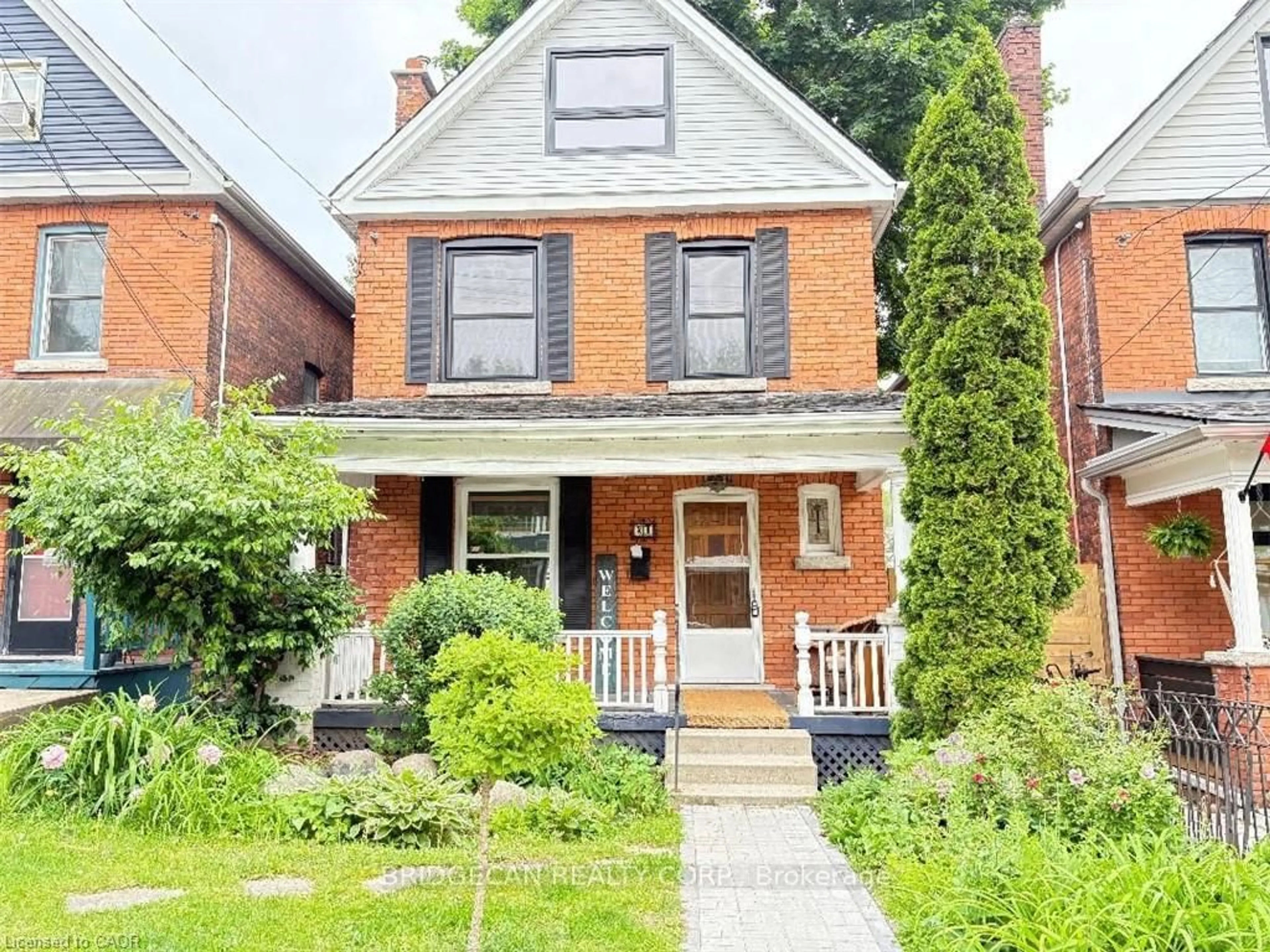 Home with brick exterior material, street for 21 Sunset Ave, Hamilton Ontario L8R 1V7