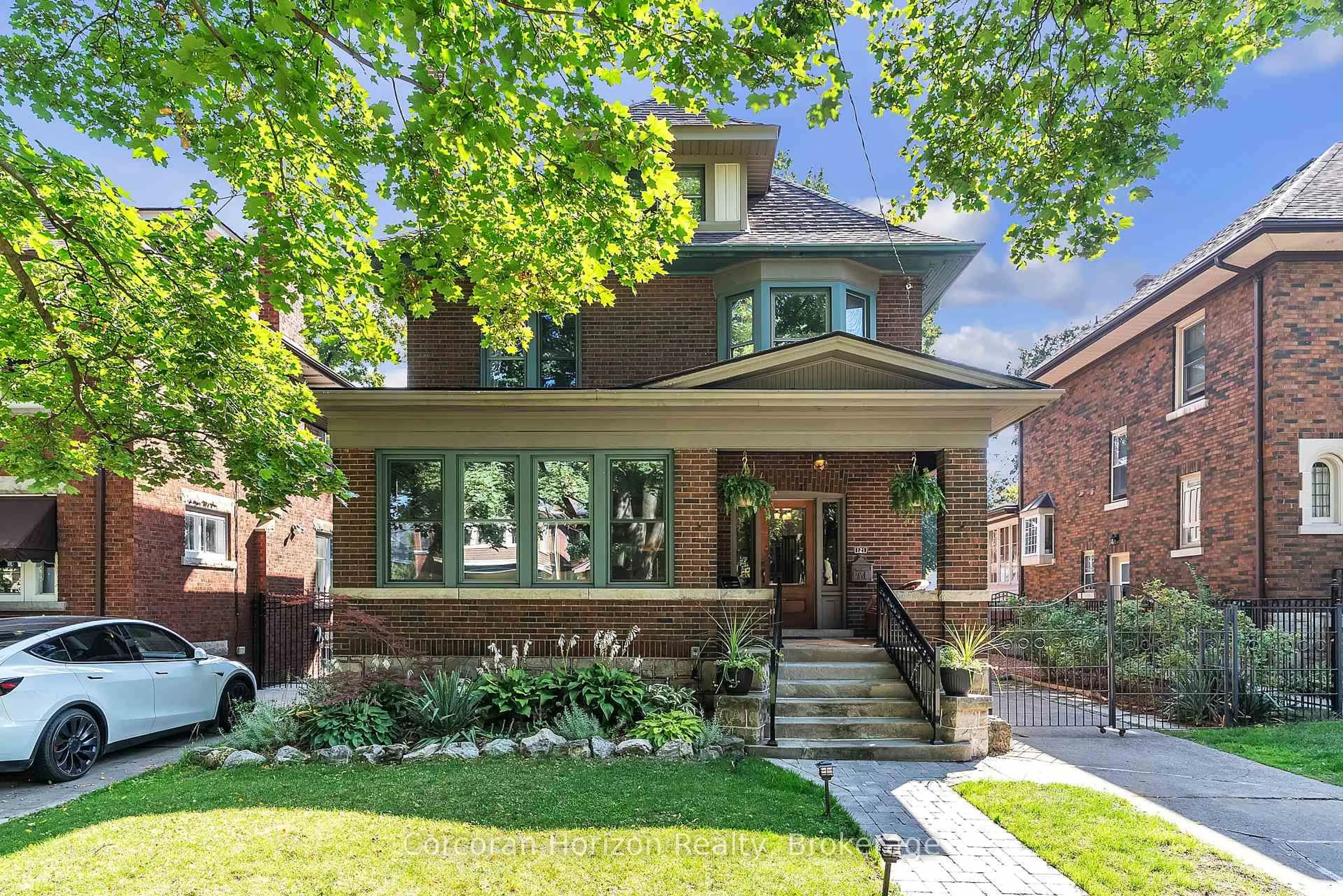 Home with brick exterior material, street for 121 St Clair Ave, Hamilton Ontario L8M 2N8