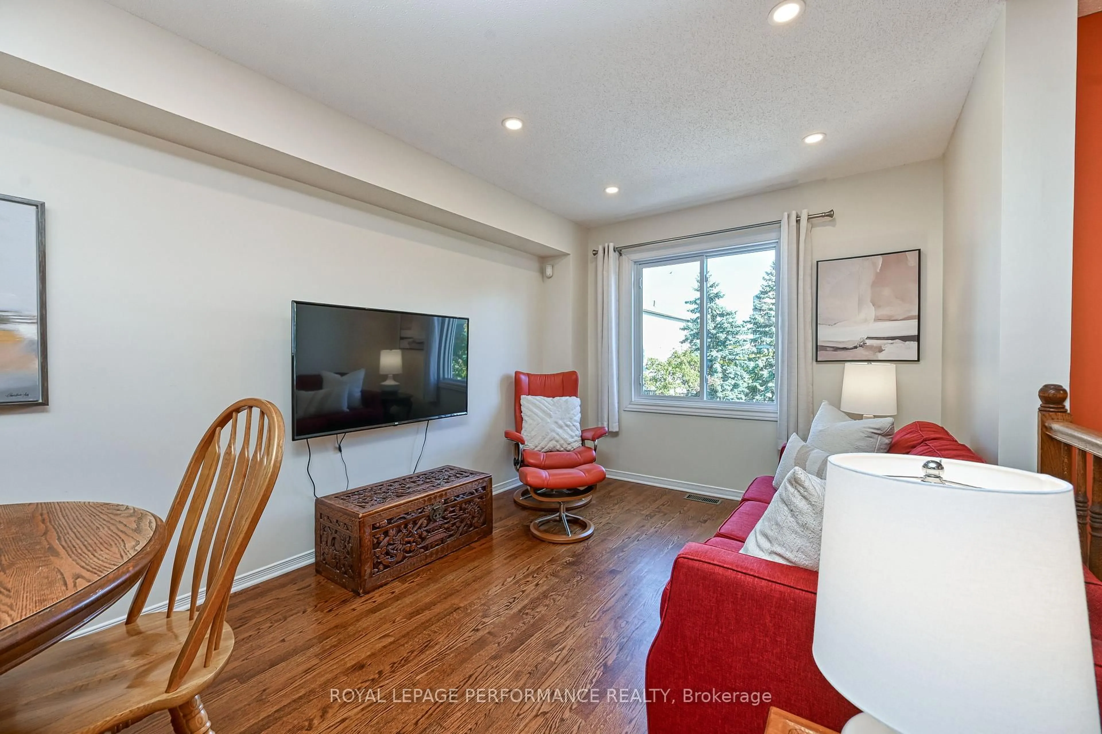 Living room with furniture, wood/laminate floor for 42 Yorkville St, Ottawa Ontario K2C 4B5