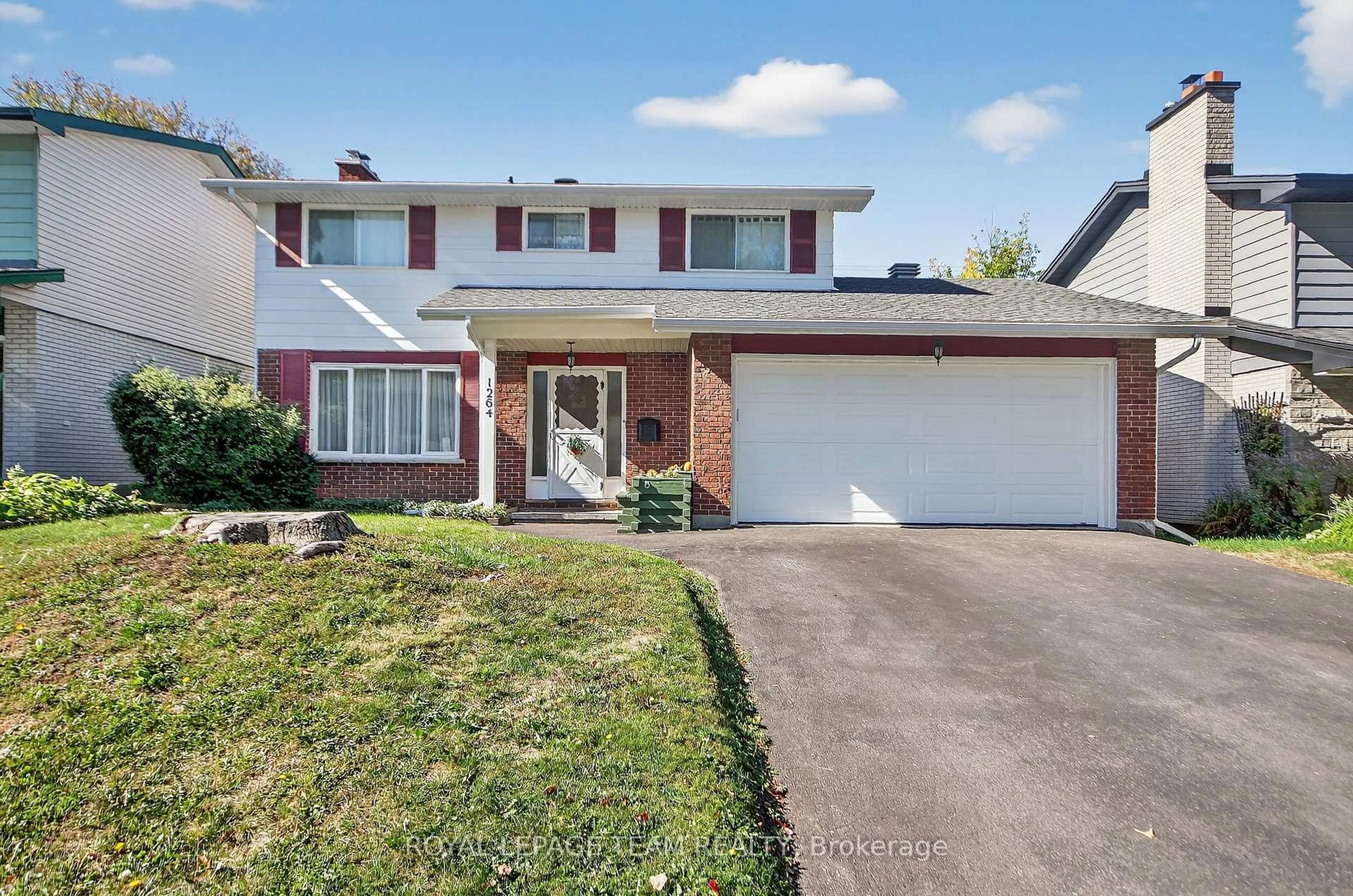 Home with vinyl exterior material, street for 1264 Morrison Dr, Ottawa Ontario K2H 7L5