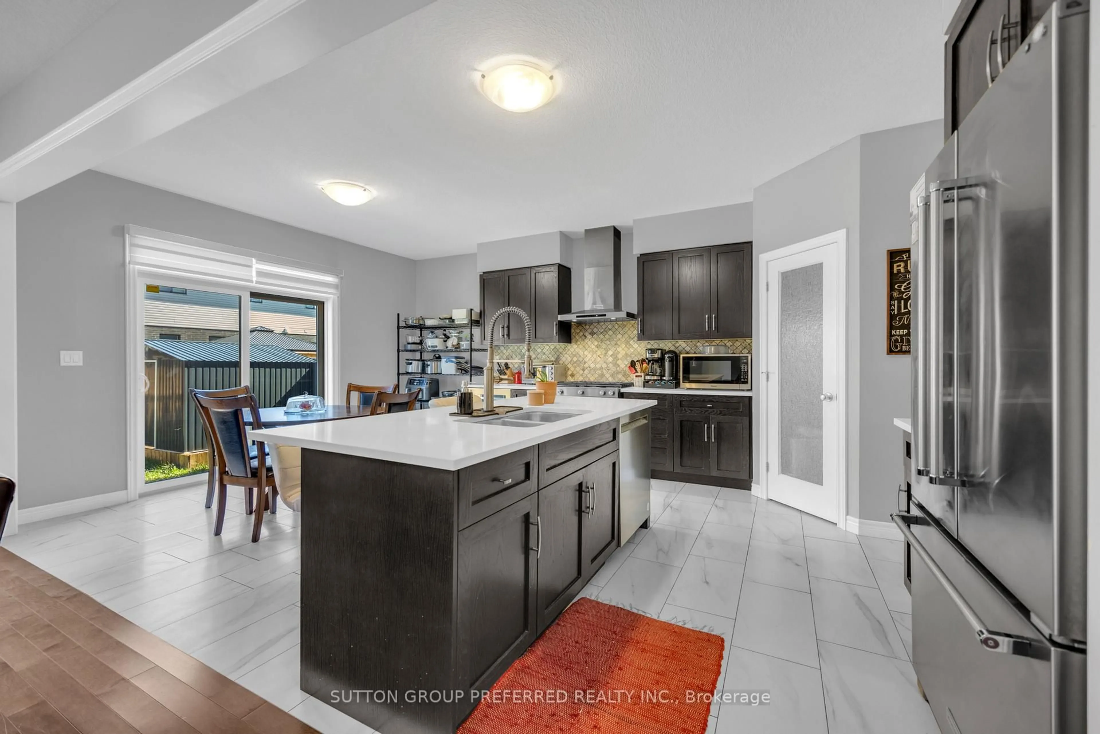 Open concept kitchen, ceramic/tile floor for 59 Spachman St, Kitchener Ontario N2R 1R7