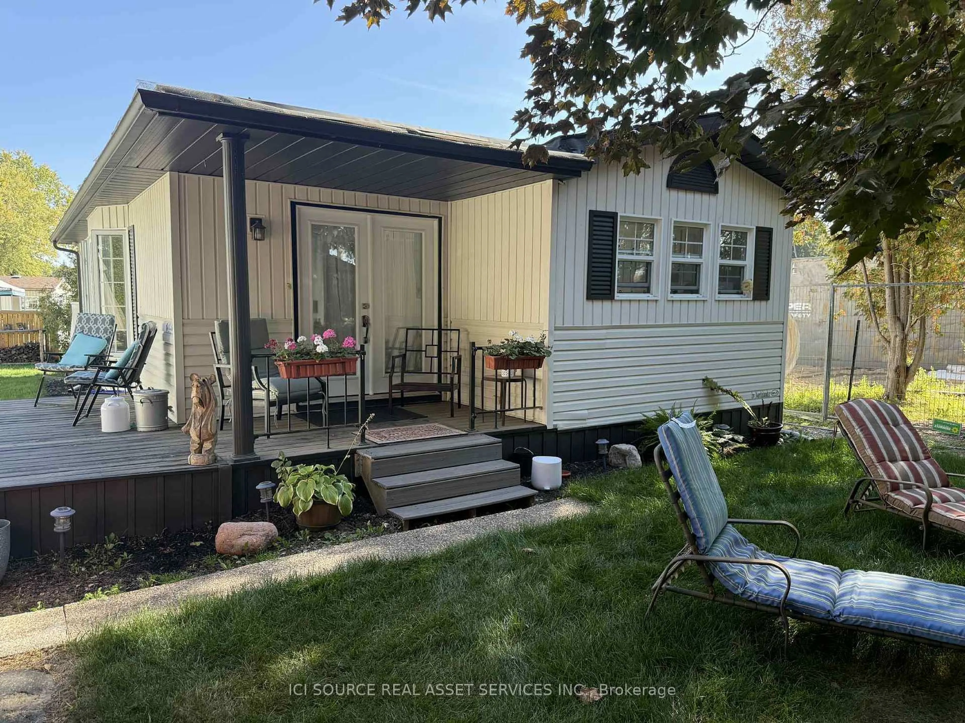 Home with vinyl exterior material, street for 580 Beaver Creek Rd #Site 13, Waterloo Ontario N2V 3Z4