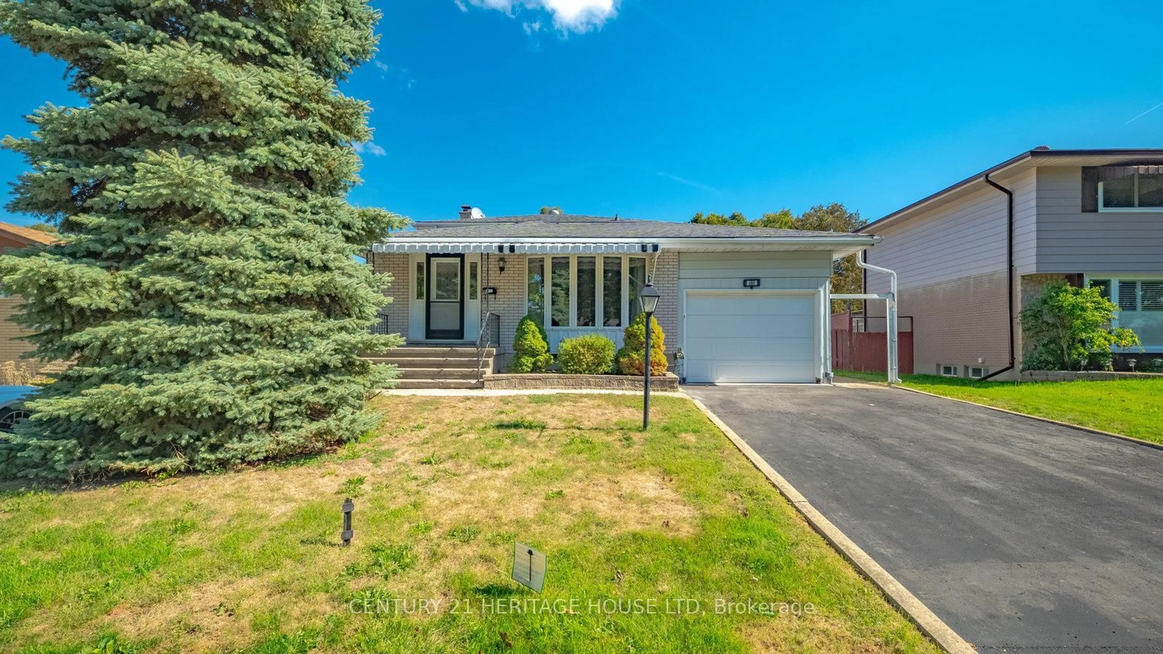 Home with vinyl exterior material, street for 15 Acorn Lane, Brantford Ontario N3R 3P3