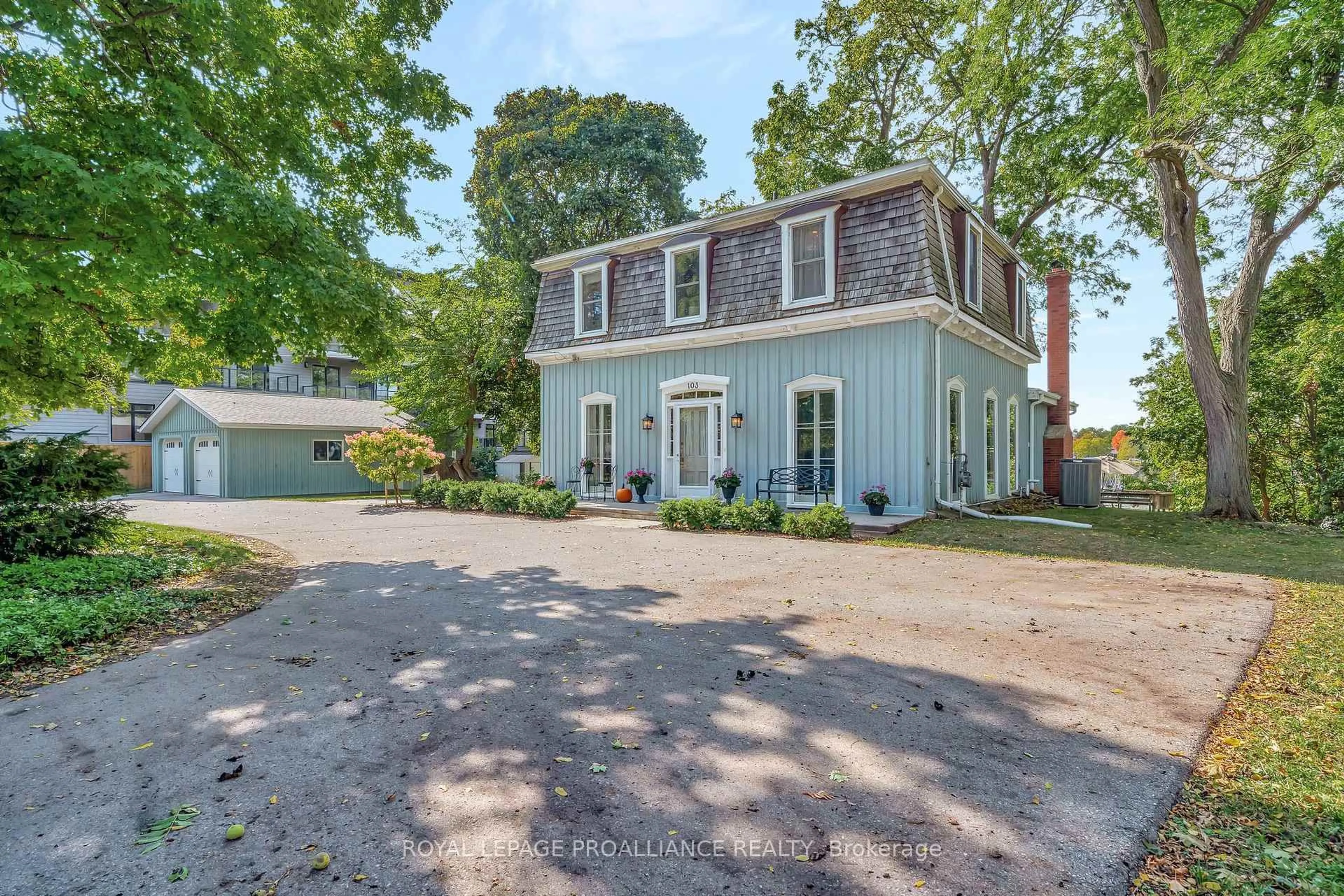 A pic from outside/outdoor area/front of a property/back of a property/a pic from drone, street for 103 Bridge St, Prince Edward County Ontario K0K 2T0