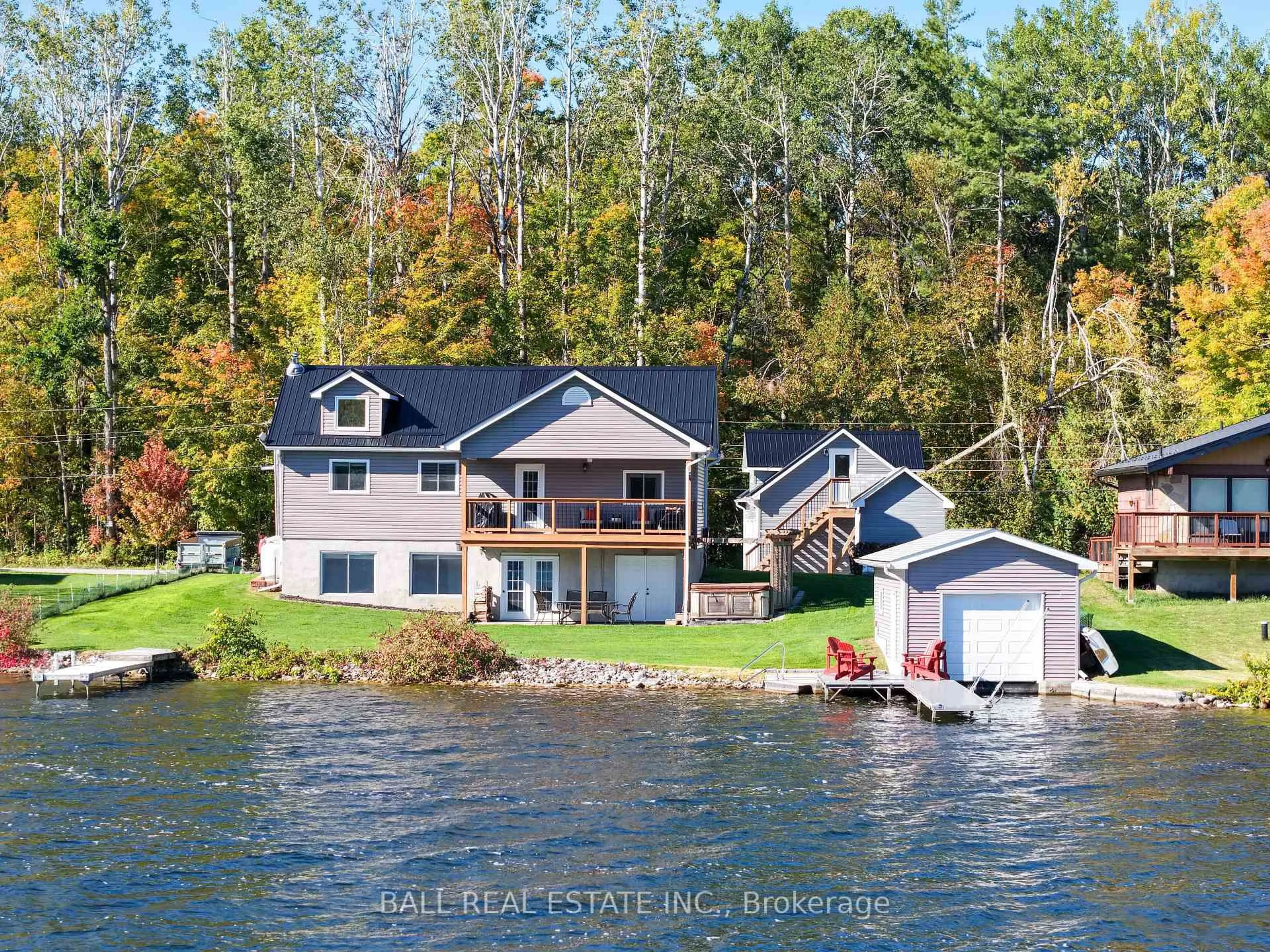 A pic from outside/outdoor area/front of a property/back of a property/a pic from drone, water/lake/river/ocean view for 2566 Fire Route 37, Selwyn Ontario K0L 2H0