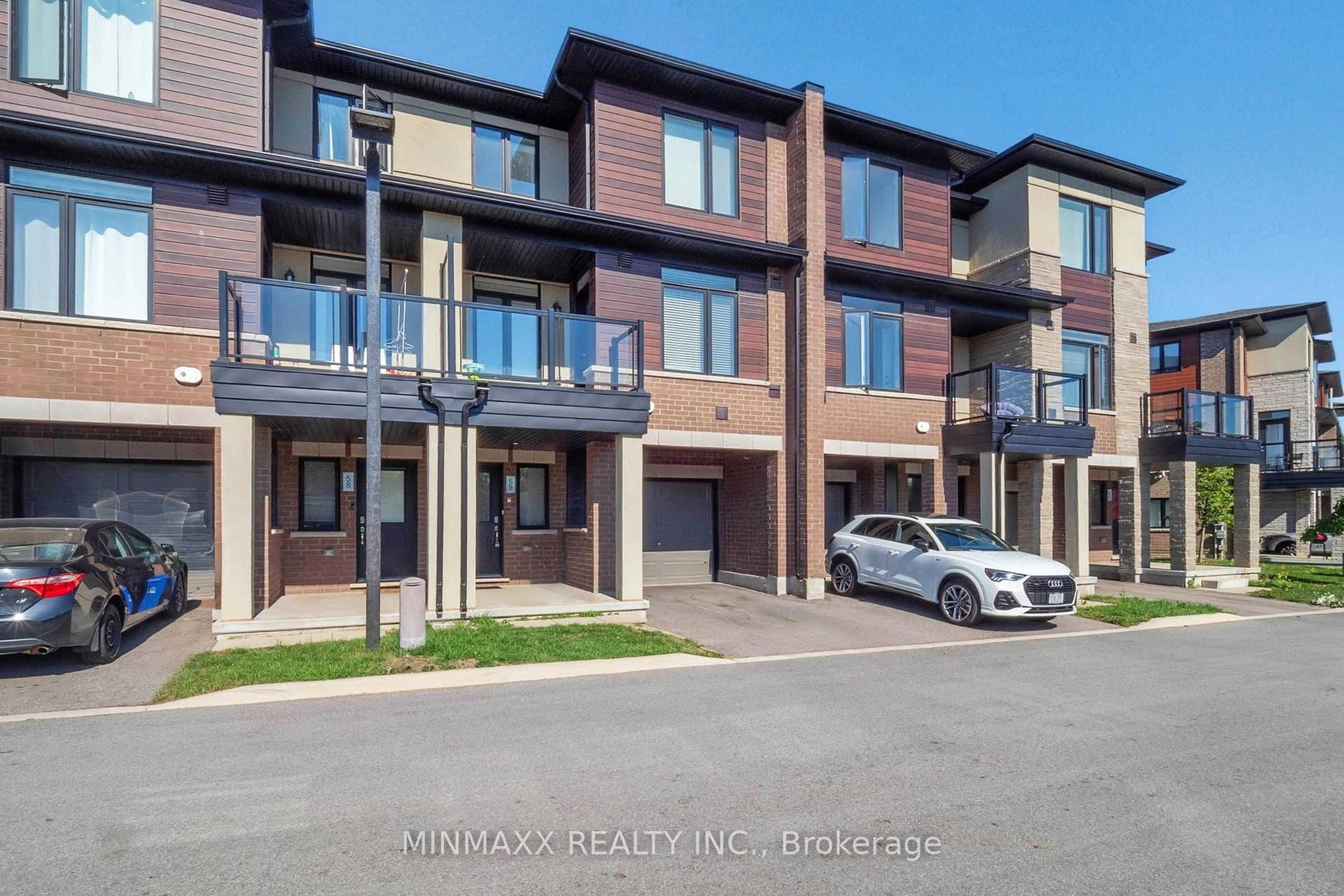 A pic from outside/outdoor area/front of a property/back of a property/a pic from drone, street for 590 North Service Rd #59, Hamilton Ontario L8E 0K5