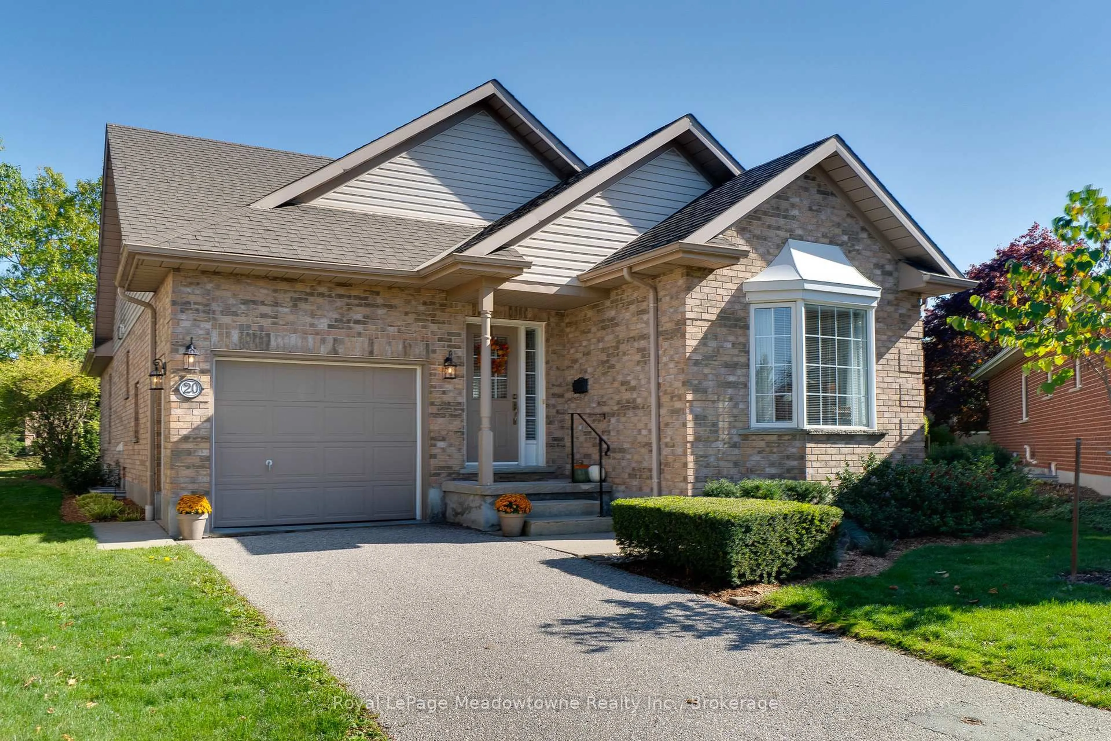 Home with brick exterior material, street for 20 Arbordale Walk, Guelph Ontario N1C 4X7