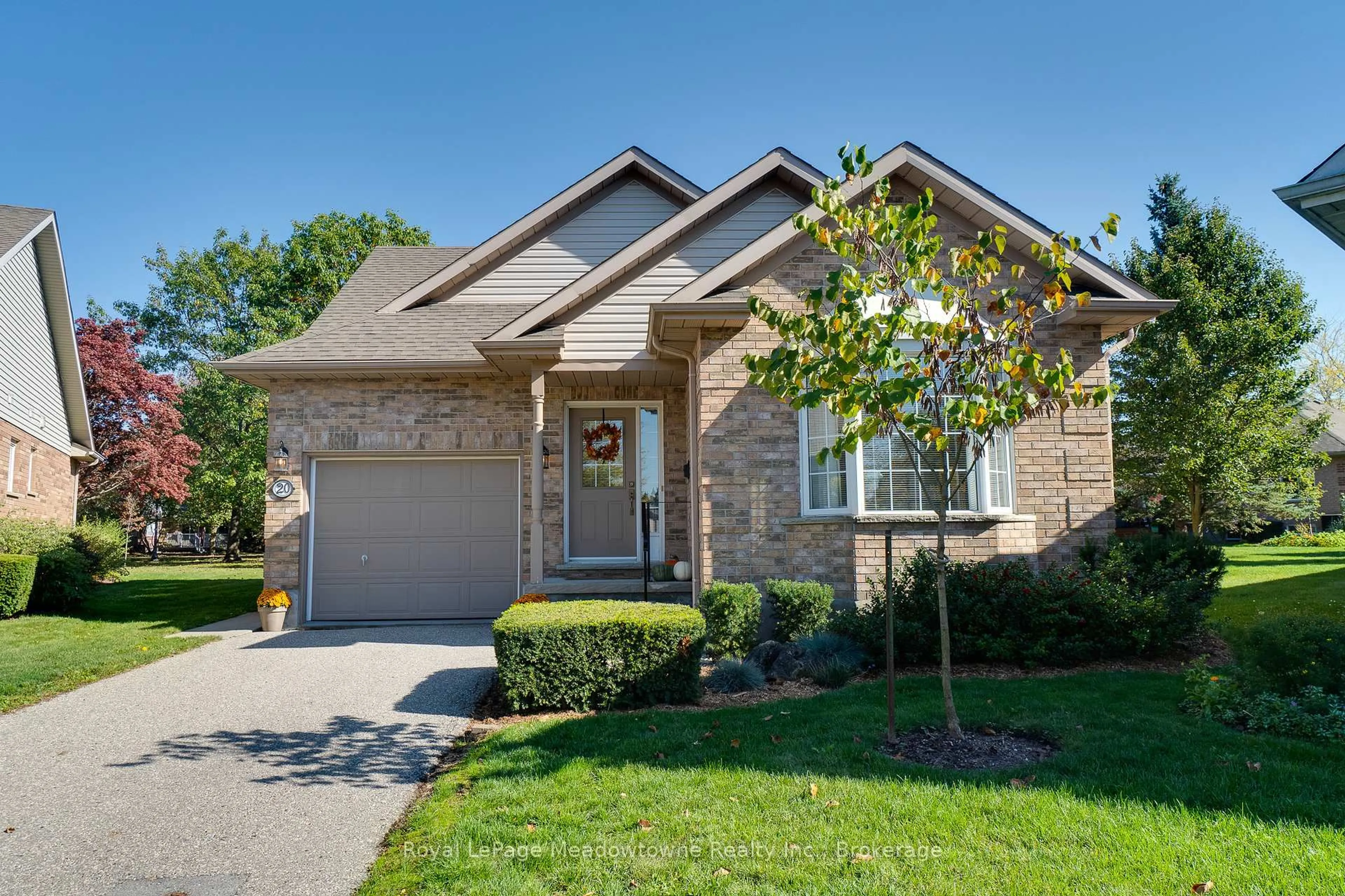 Home with brick exterior material, street for 20 Arbordale Walk, Guelph Ontario N1C 4X7