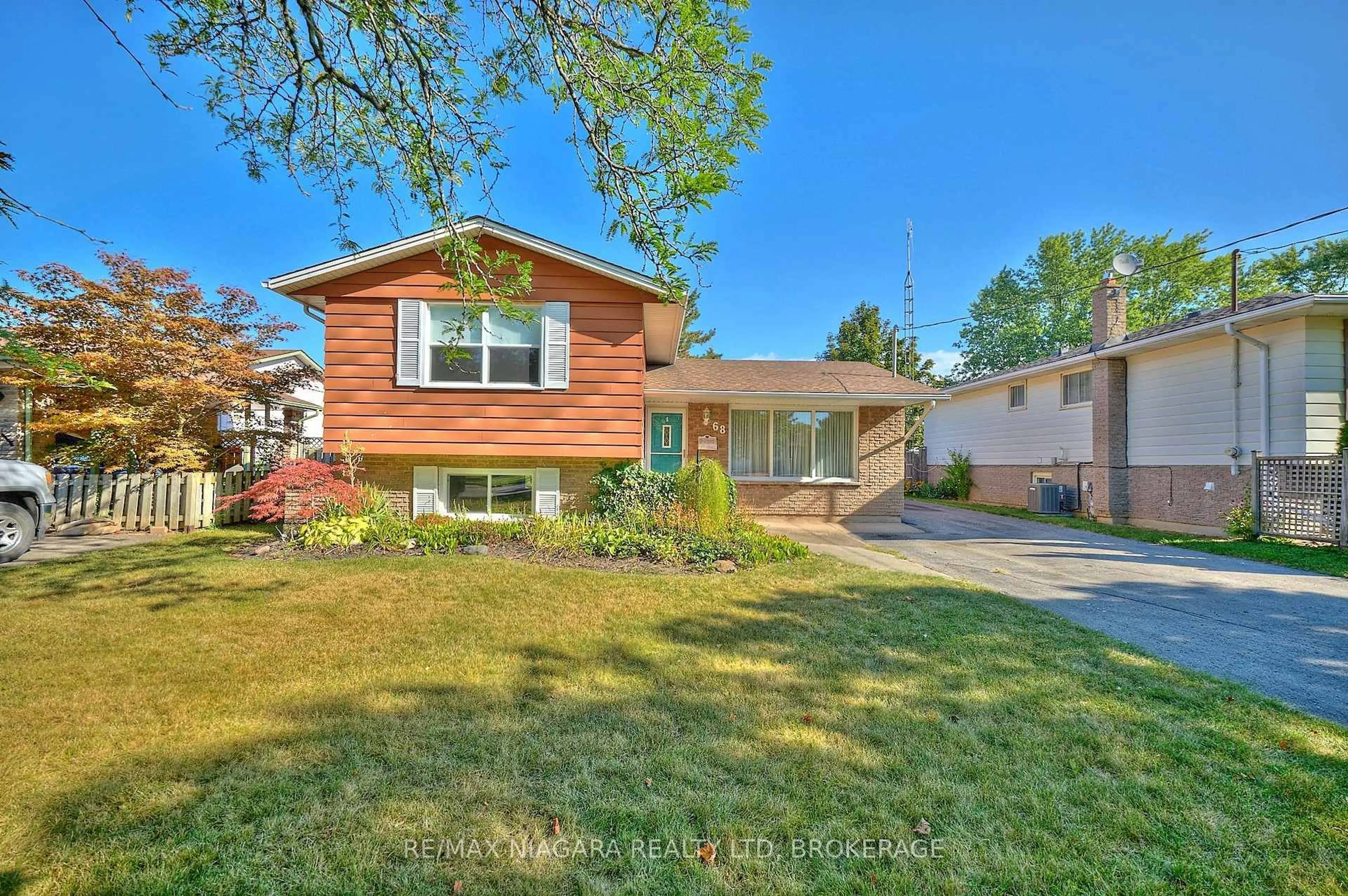 Home with brick exterior material, street for 68 Acadia Cres, St. Catharines Ontario L2P 1H8
