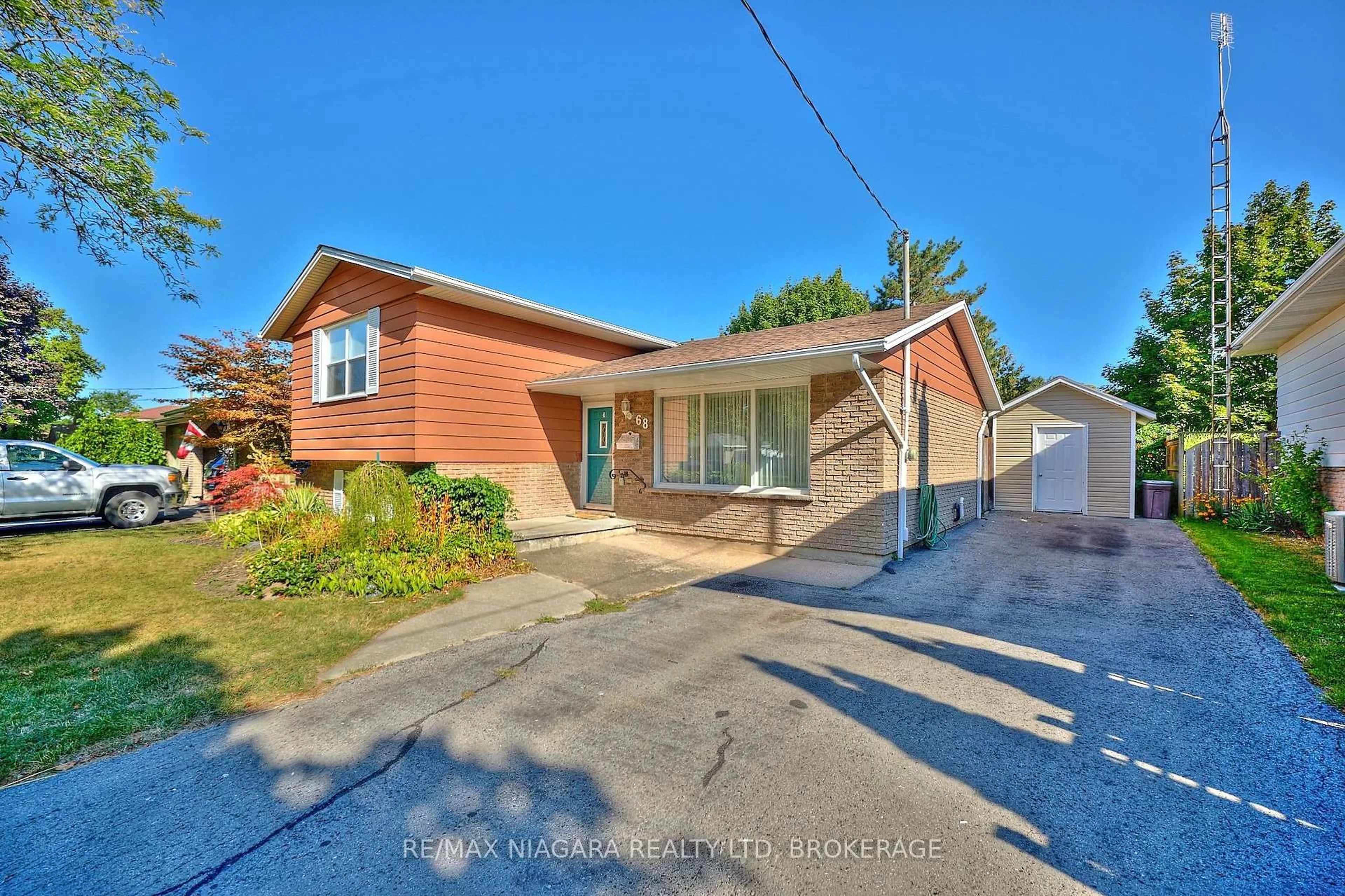 Home with brick exterior material, street for 68 Acadia Cres, St. Catharines Ontario L2P 1H8