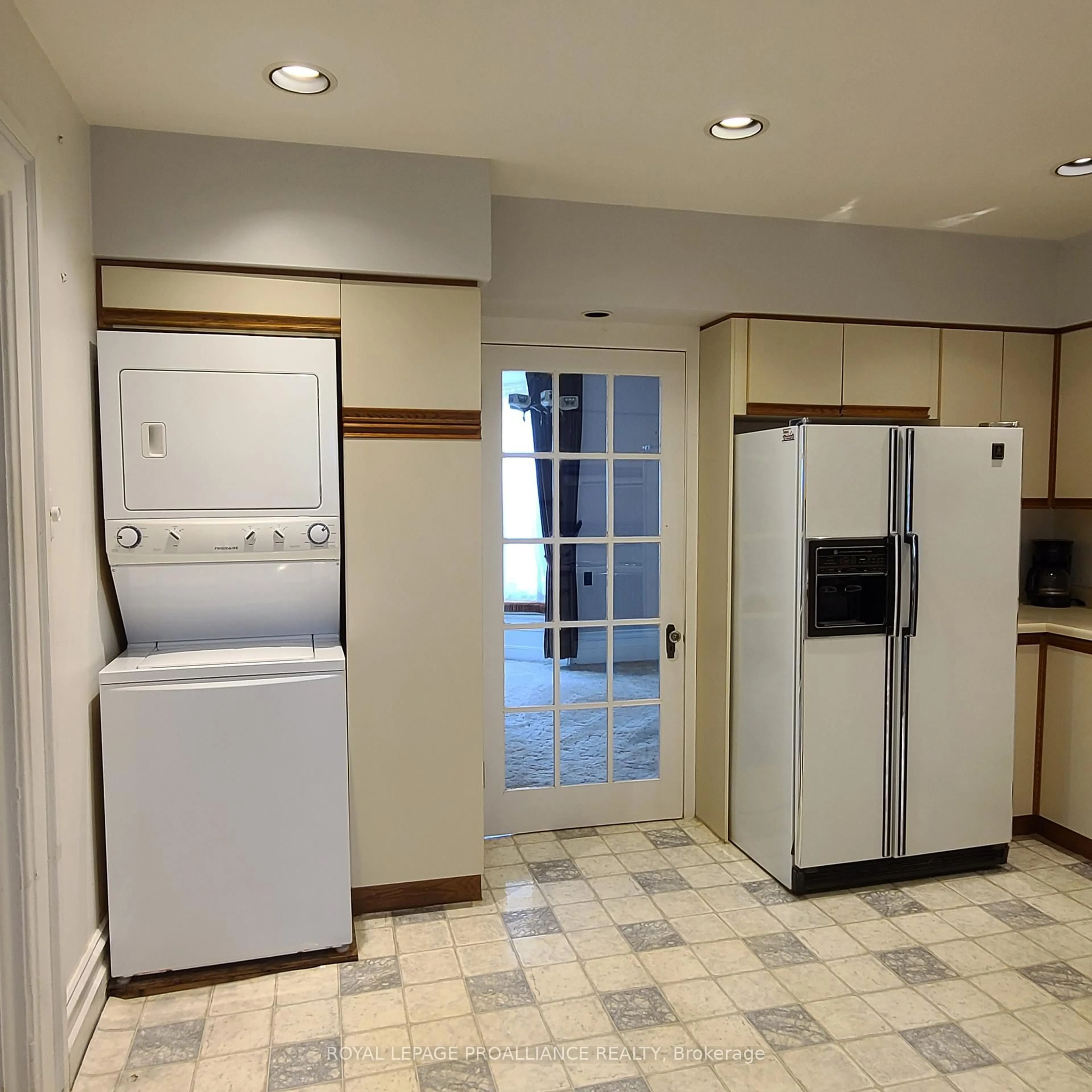 Kitchen with laundary machines, unknown for 634 Henry St, Prescott Ontario K0E 1T0