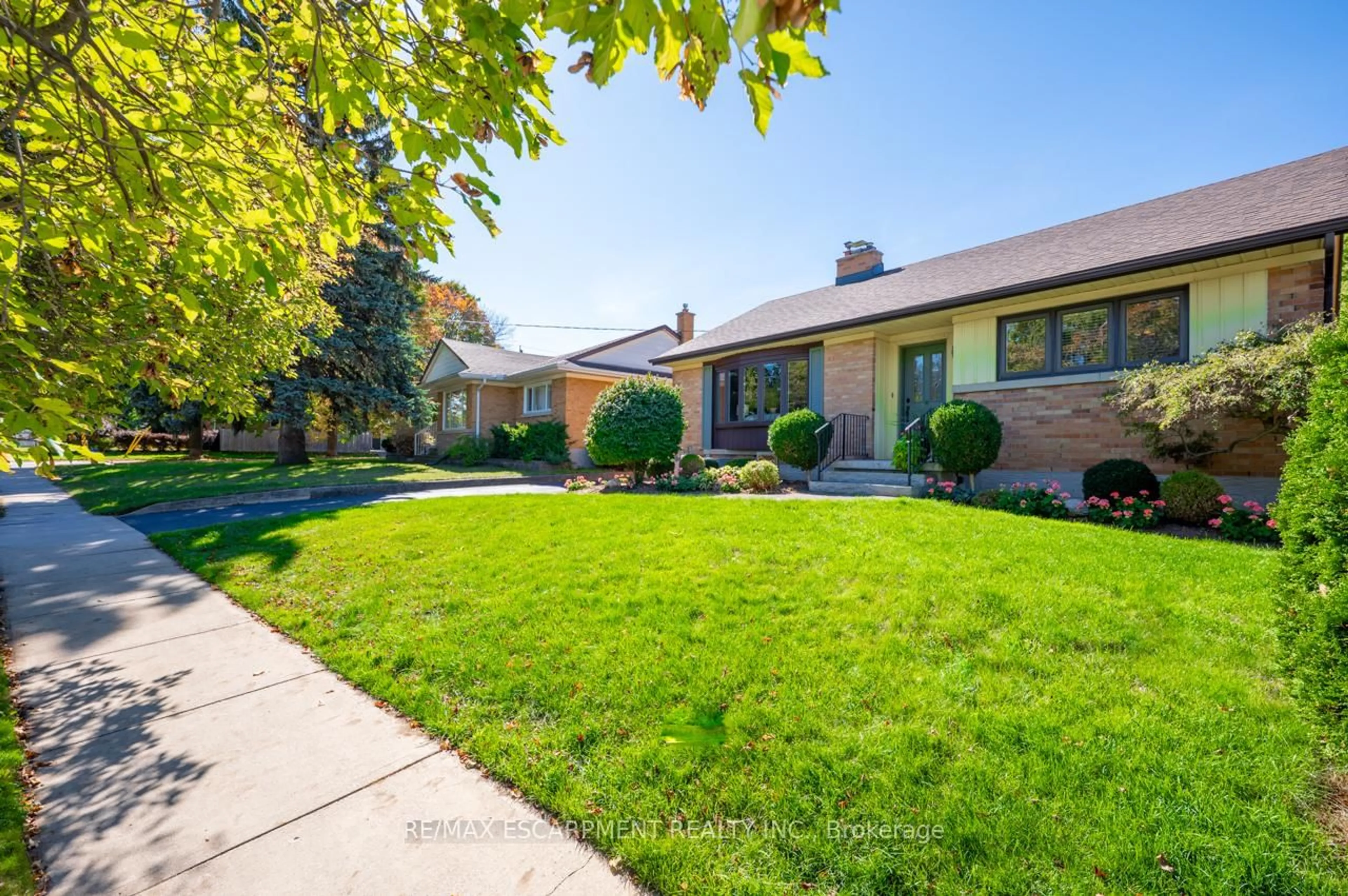 Home with brick exterior material, street for 97 Ellis Cres, Waterloo Ontario N2J 2B9