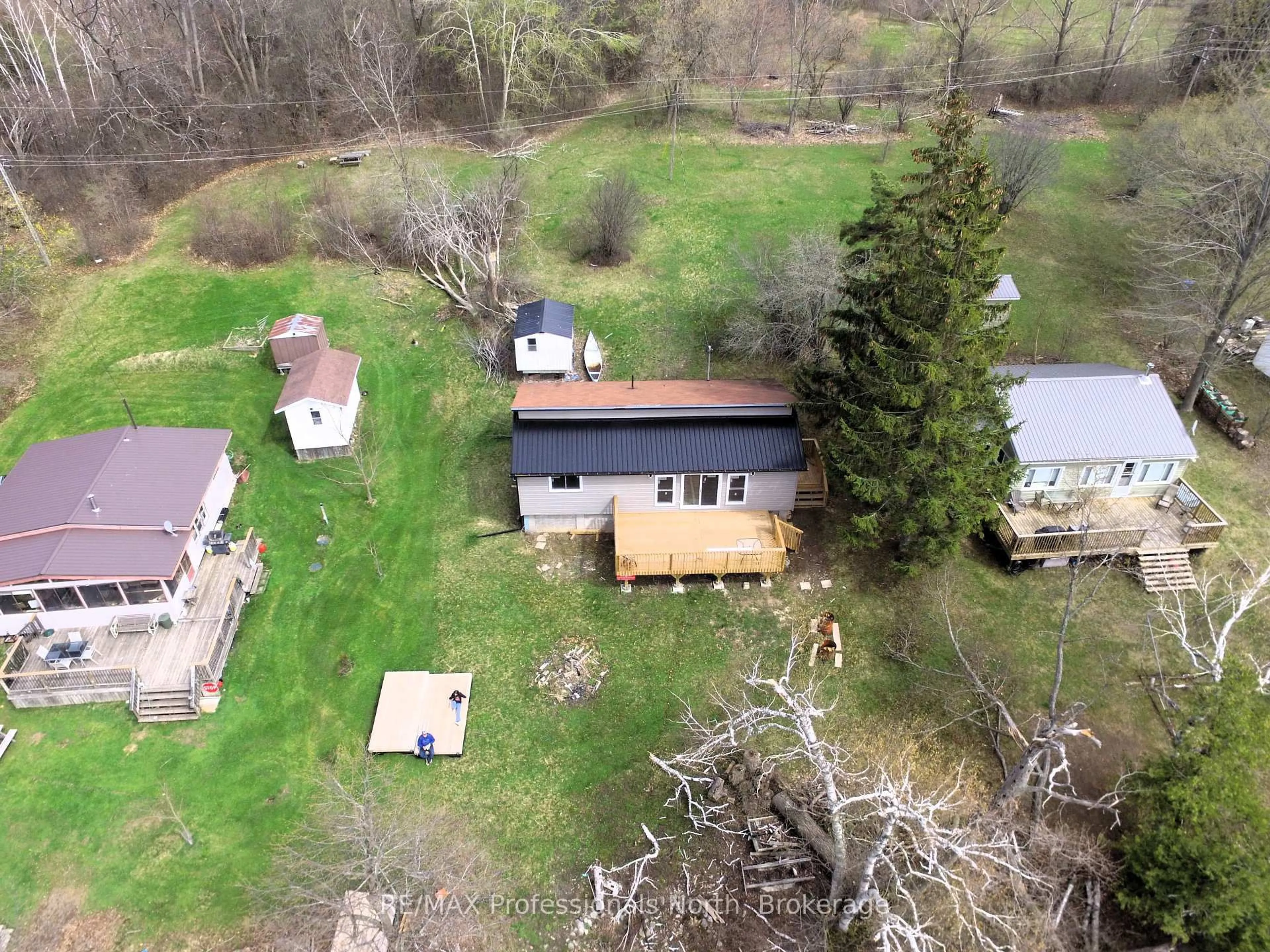 A pic from outside/outdoor area/front of a property/back of a property/a pic from drone, unknown for 53 Long Island, Otonabee-South Monaghan Ontario K0L 1B0
