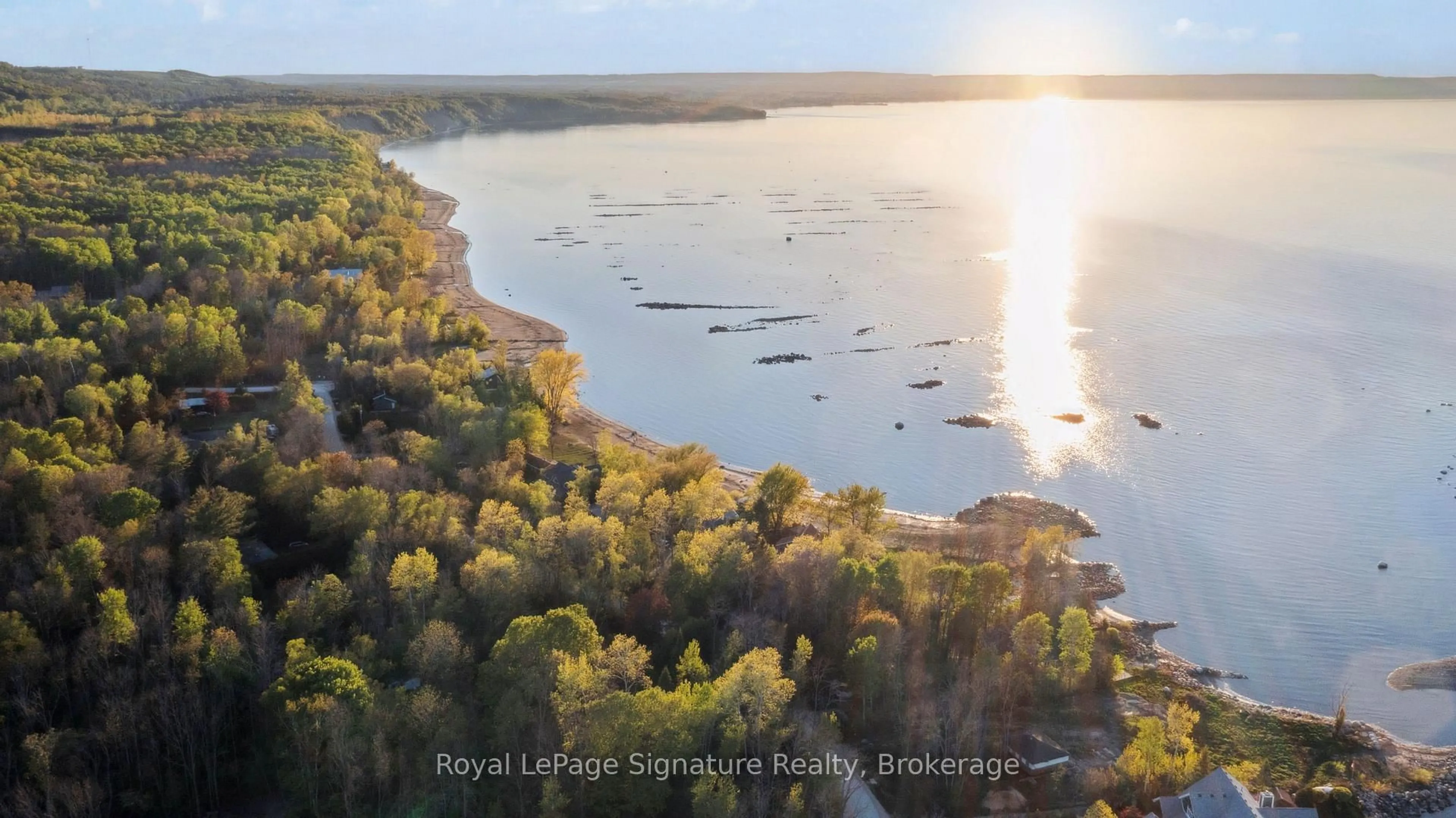 A pic from outside/outdoor area/front of a property/back of a property/a pic from drone, water/lake/river/ocean view for 129 Sunset Blvd, Blue Mountains Ontario N0H 2P0