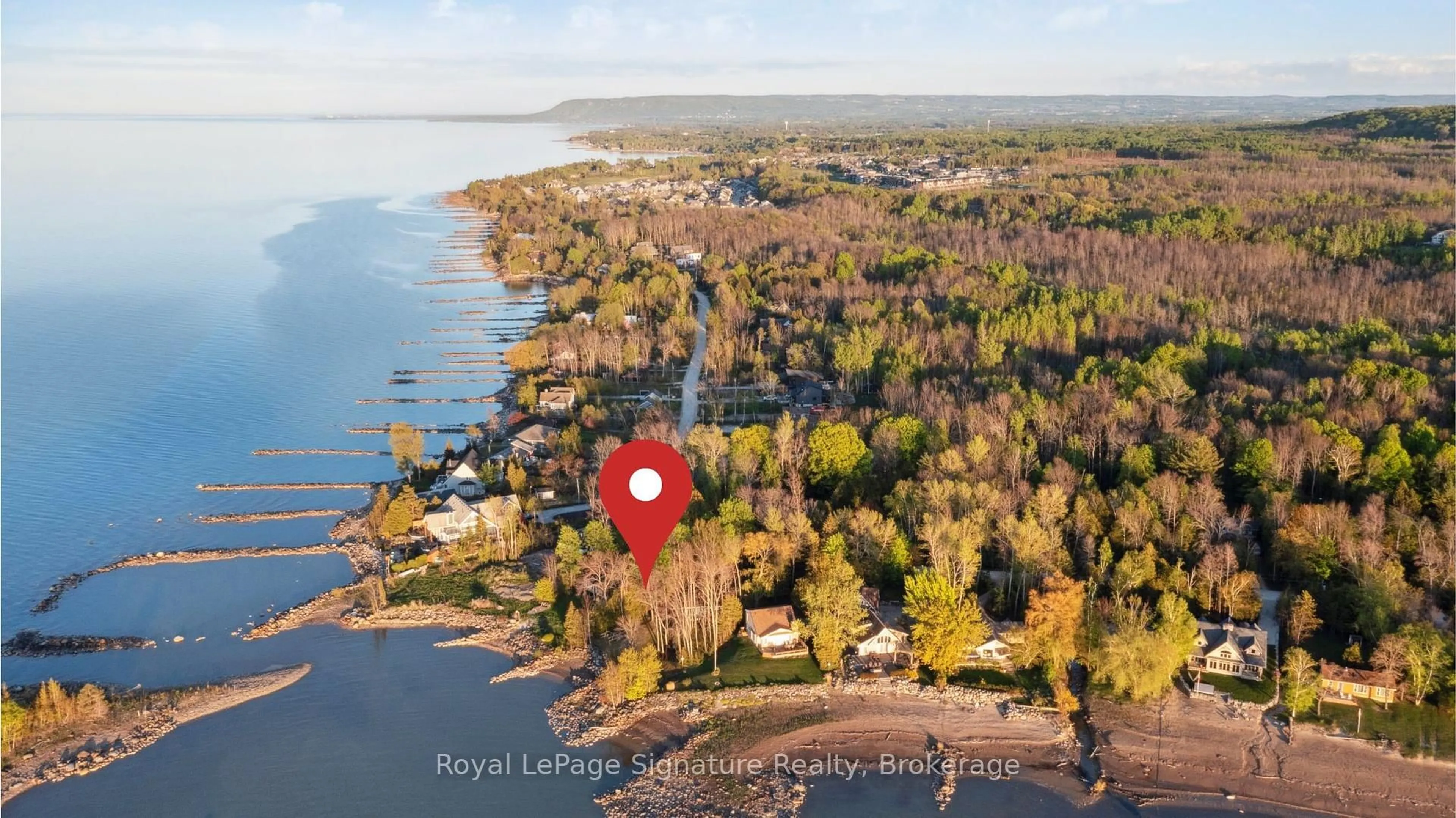 A pic from outside/outdoor area/front of a property/back of a property/a pic from drone, water/lake/river/ocean view for 129 Sunset Blvd, Blue Mountains Ontario N0H 2P0