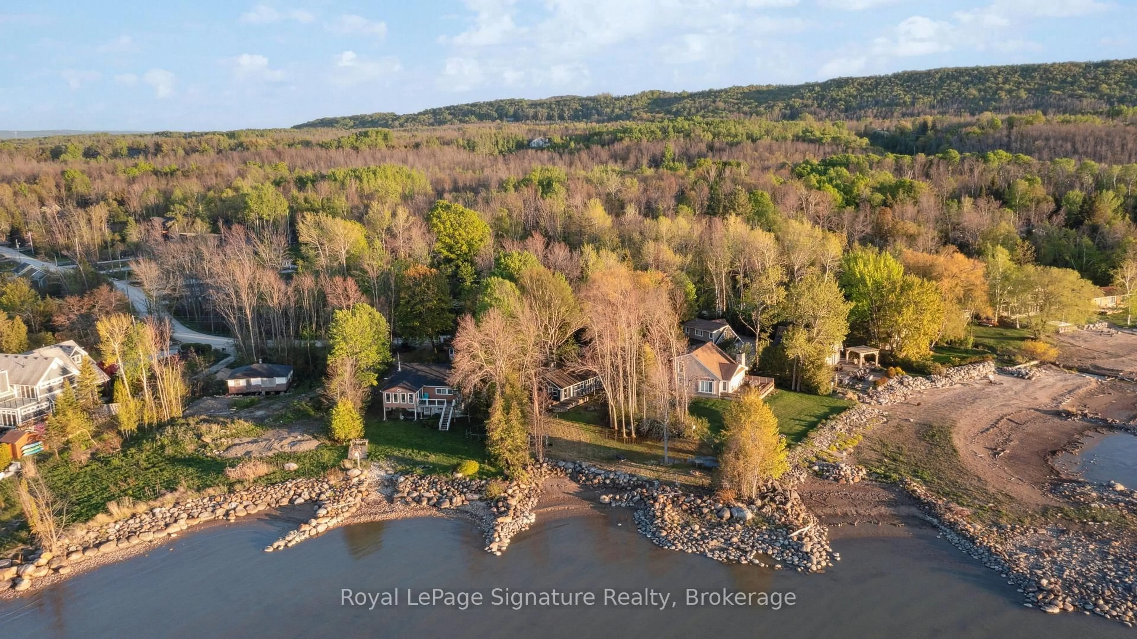 A pic from outside/outdoor area/front of a property/back of a property/a pic from drone, water/lake/river/ocean view for 129 Sunset Blvd, Blue Mountains Ontario N0H 2P0