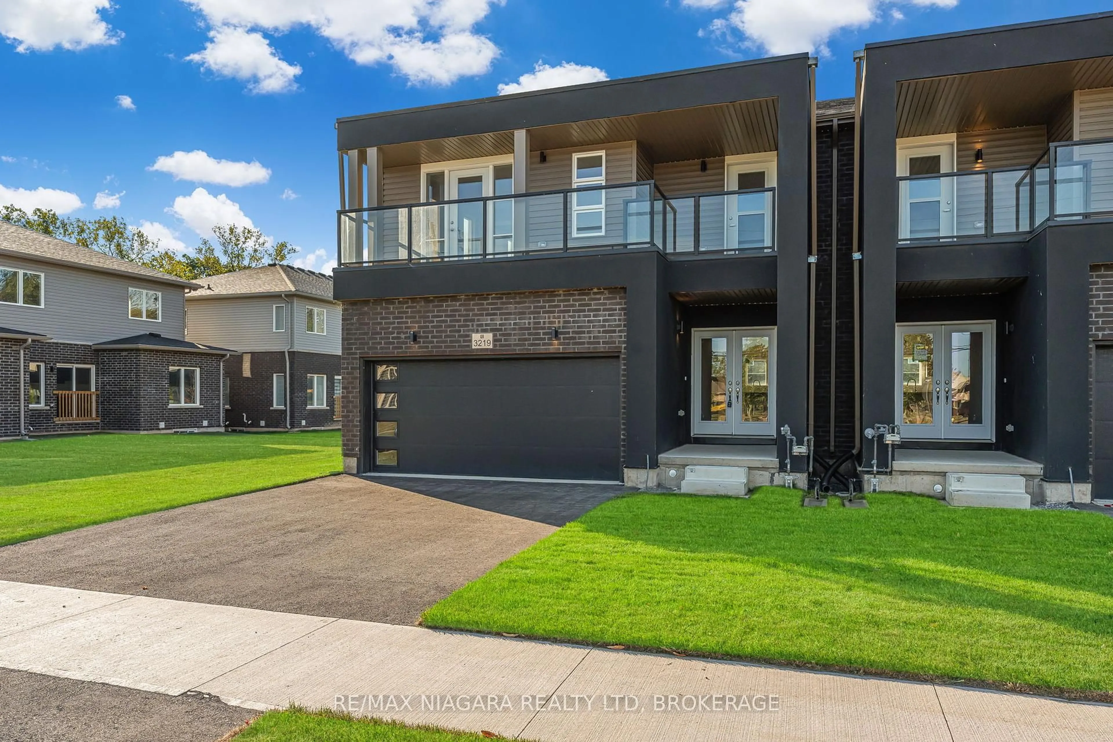 Home with brick exterior material, street for 3219 DOMINION Rd, Fort Erie Ontario L0S 1N0