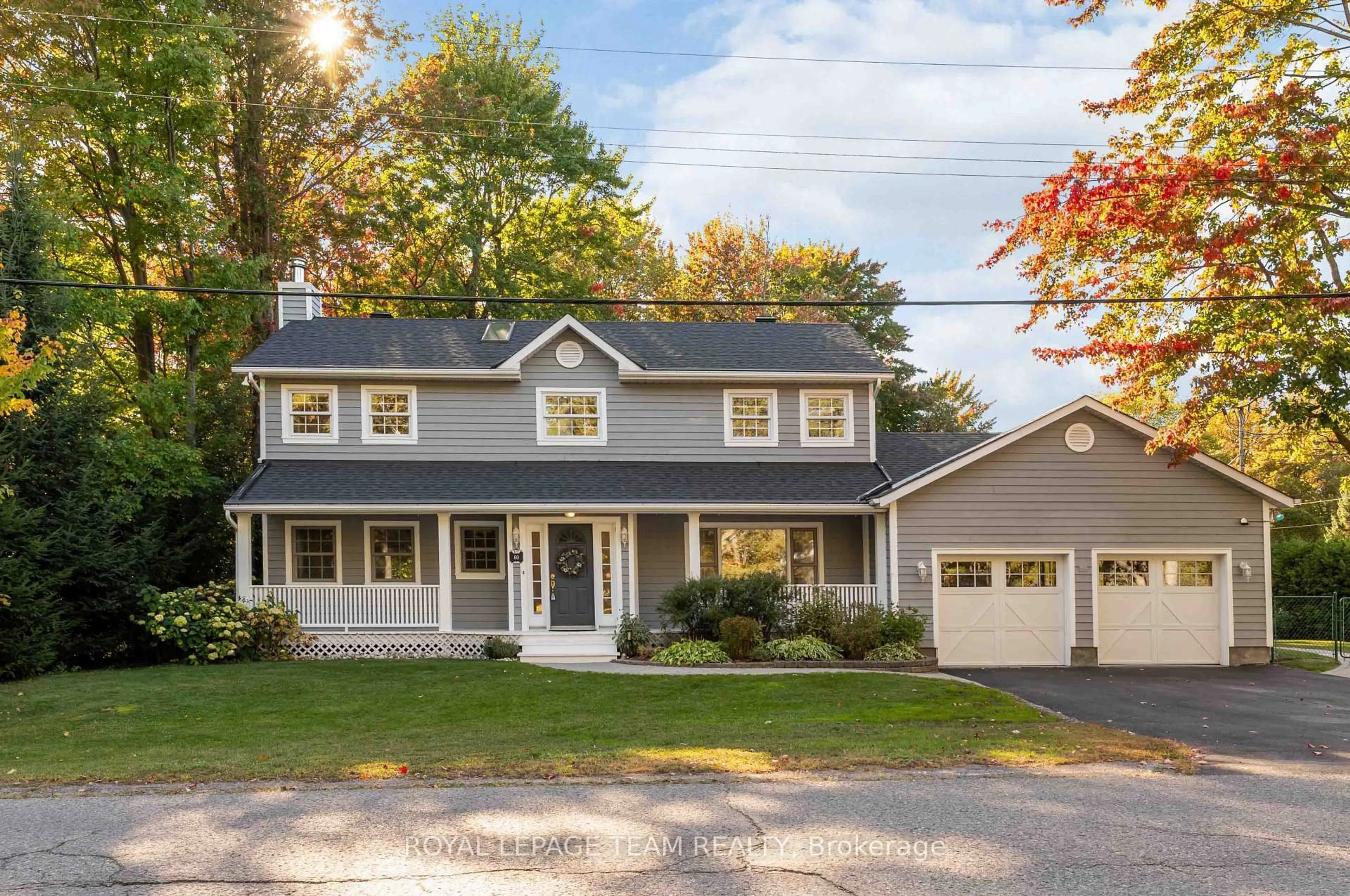 Home with vinyl exterior material, street for 60 Vaan Dr, Ottawa Ontario K2G 0C9