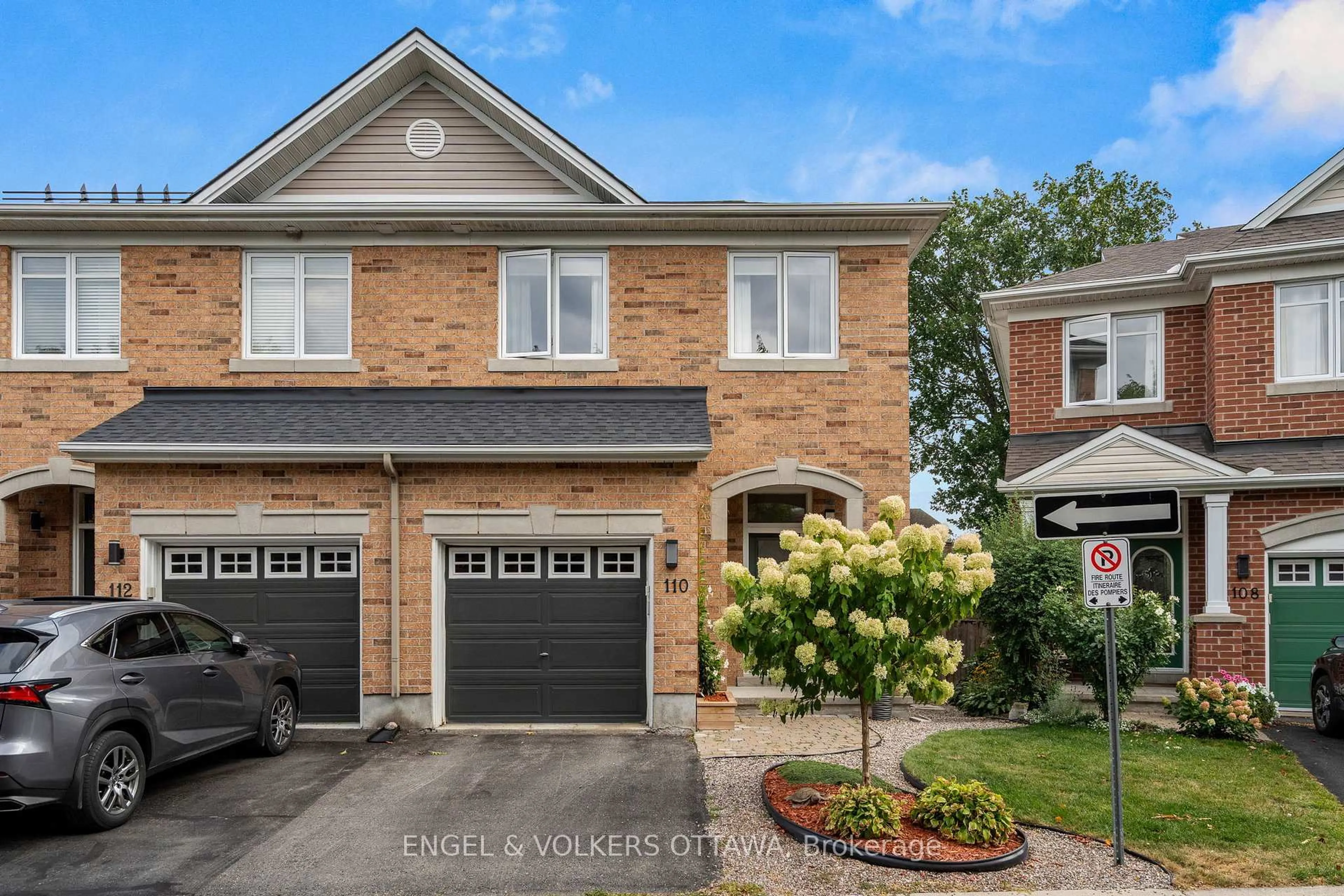 Home with brick exterior material, street for 110 Encore Private, Ottawa Ontario K2E 0A2