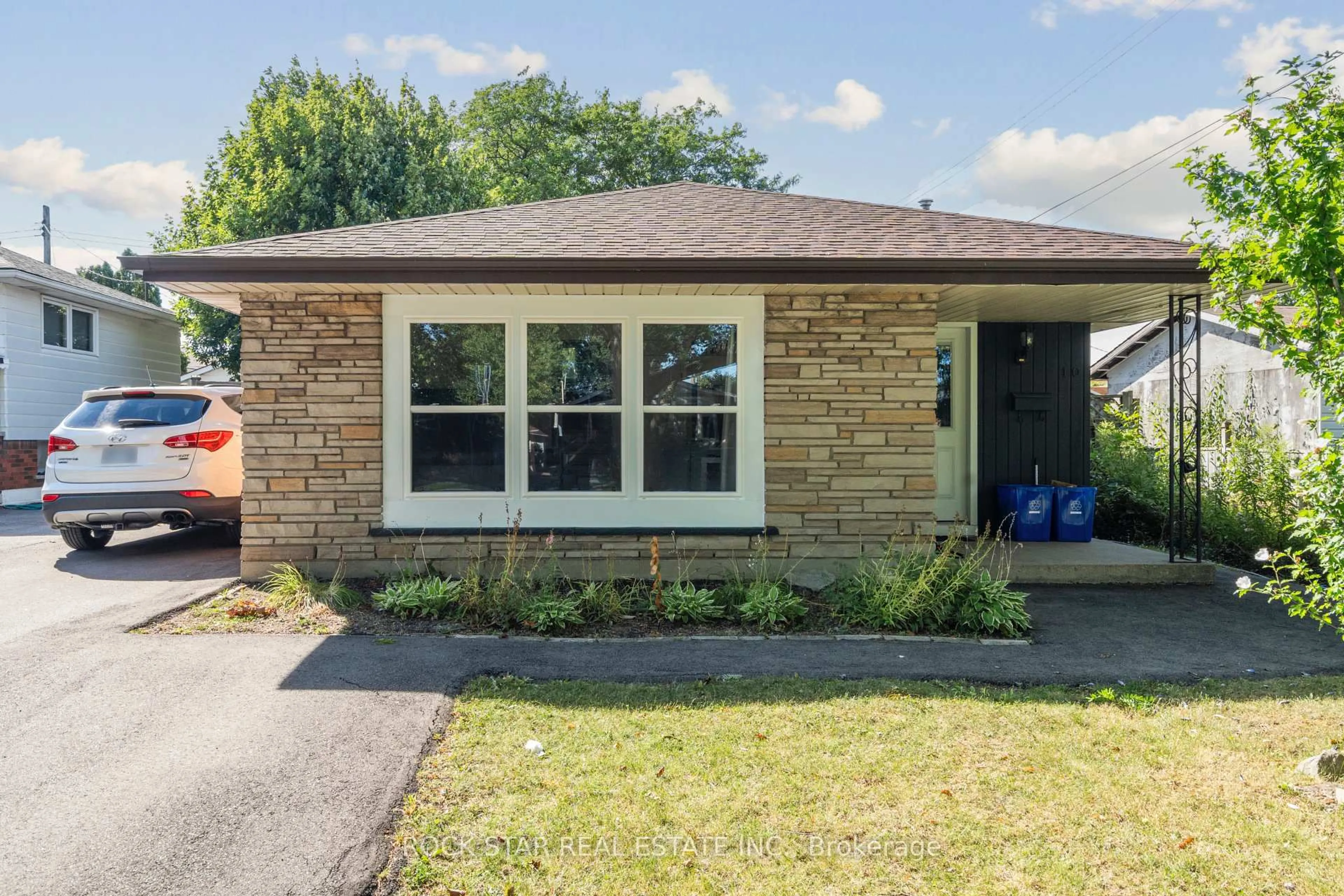 Home with brick exterior material, street for 10 Sycamore St, Hamilton Ontario L8T 3N7