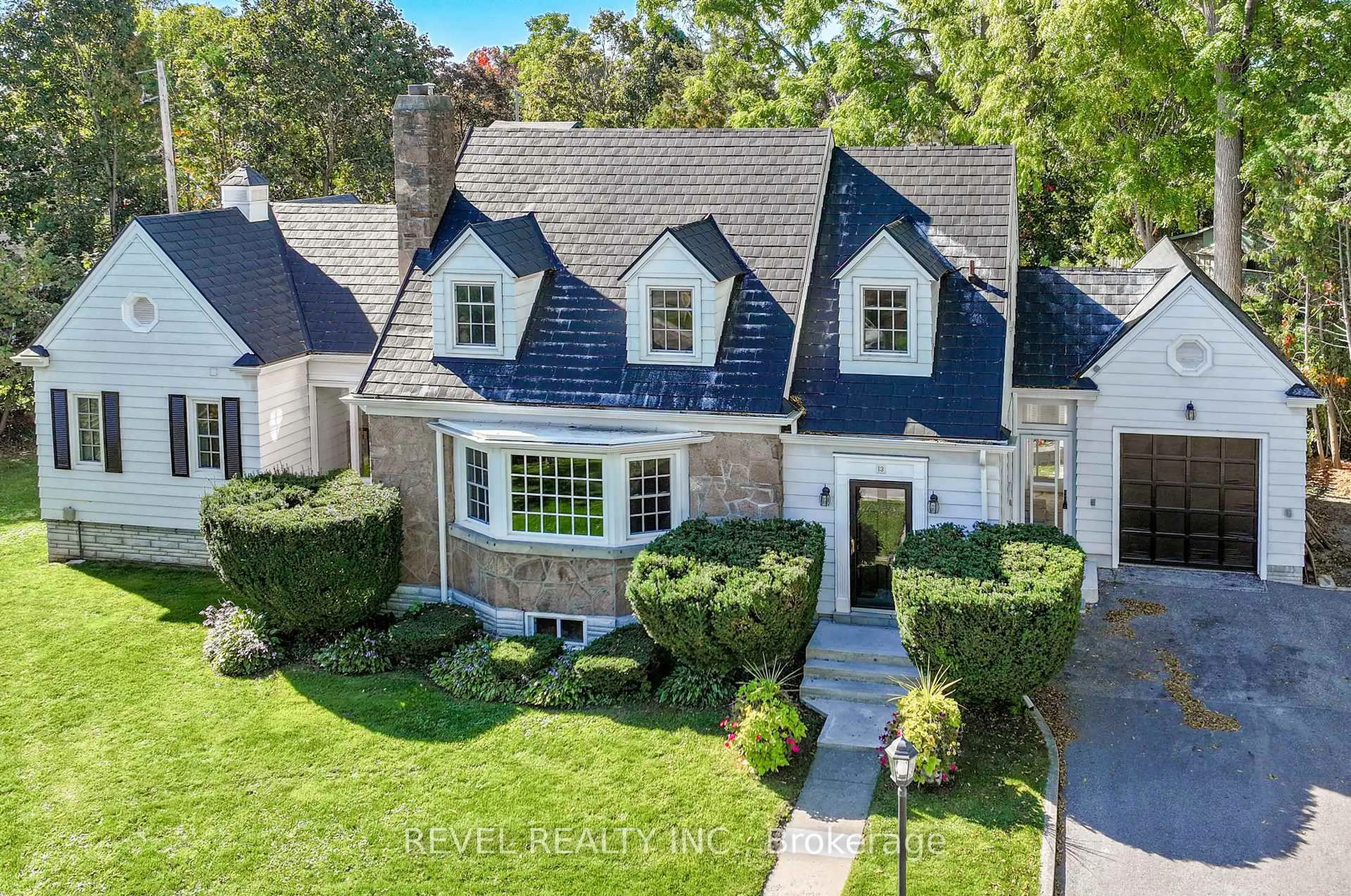 A pic from outside/outdoor area/front of a property/back of a property/a pic from drone, street for 13 Sylvan Cres, Kawartha Lakes Ontario K9V 2W4