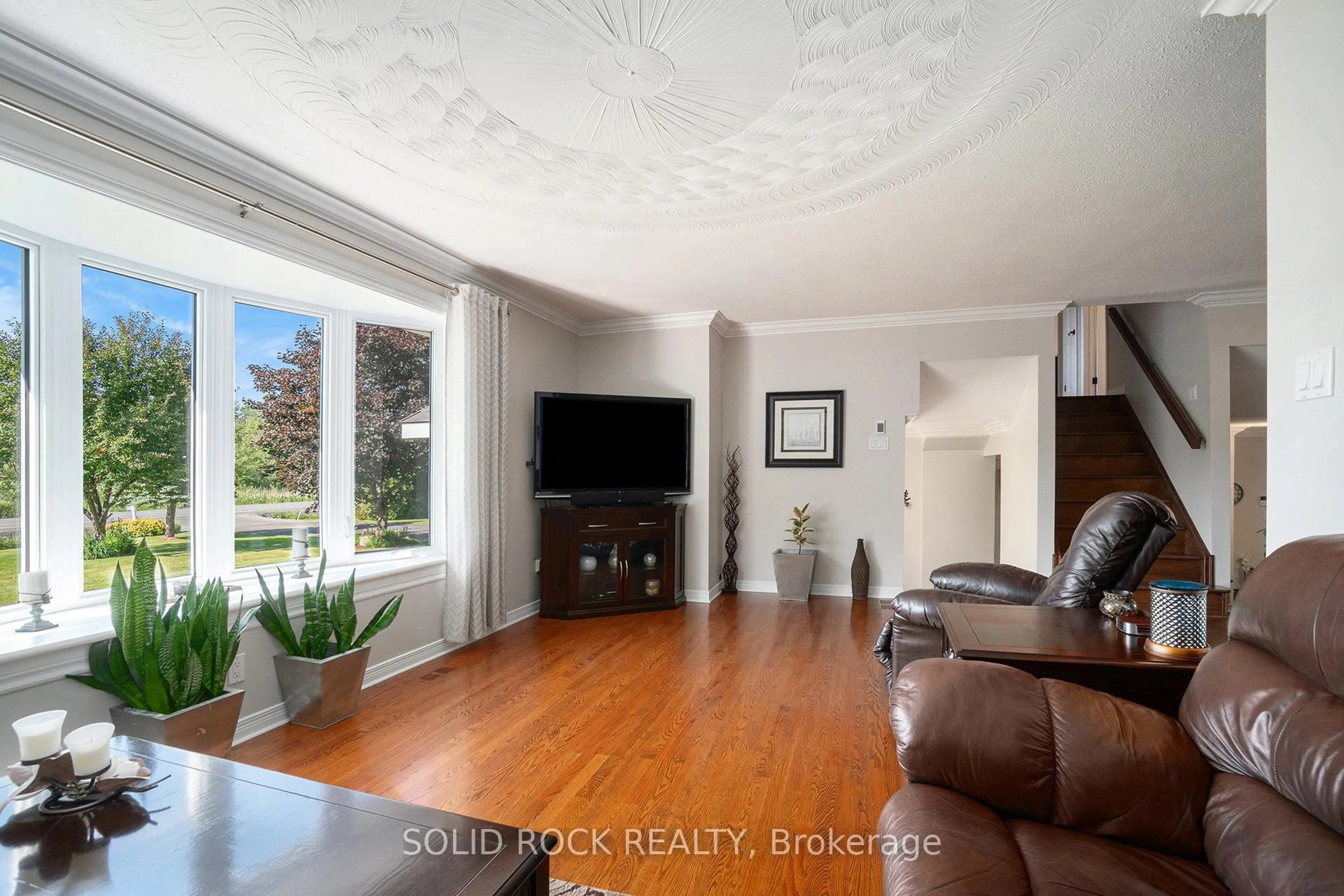 Living room with furniture, wood/laminate floor for 2278 Russland Rd, Russell Ontario K0A 3H0