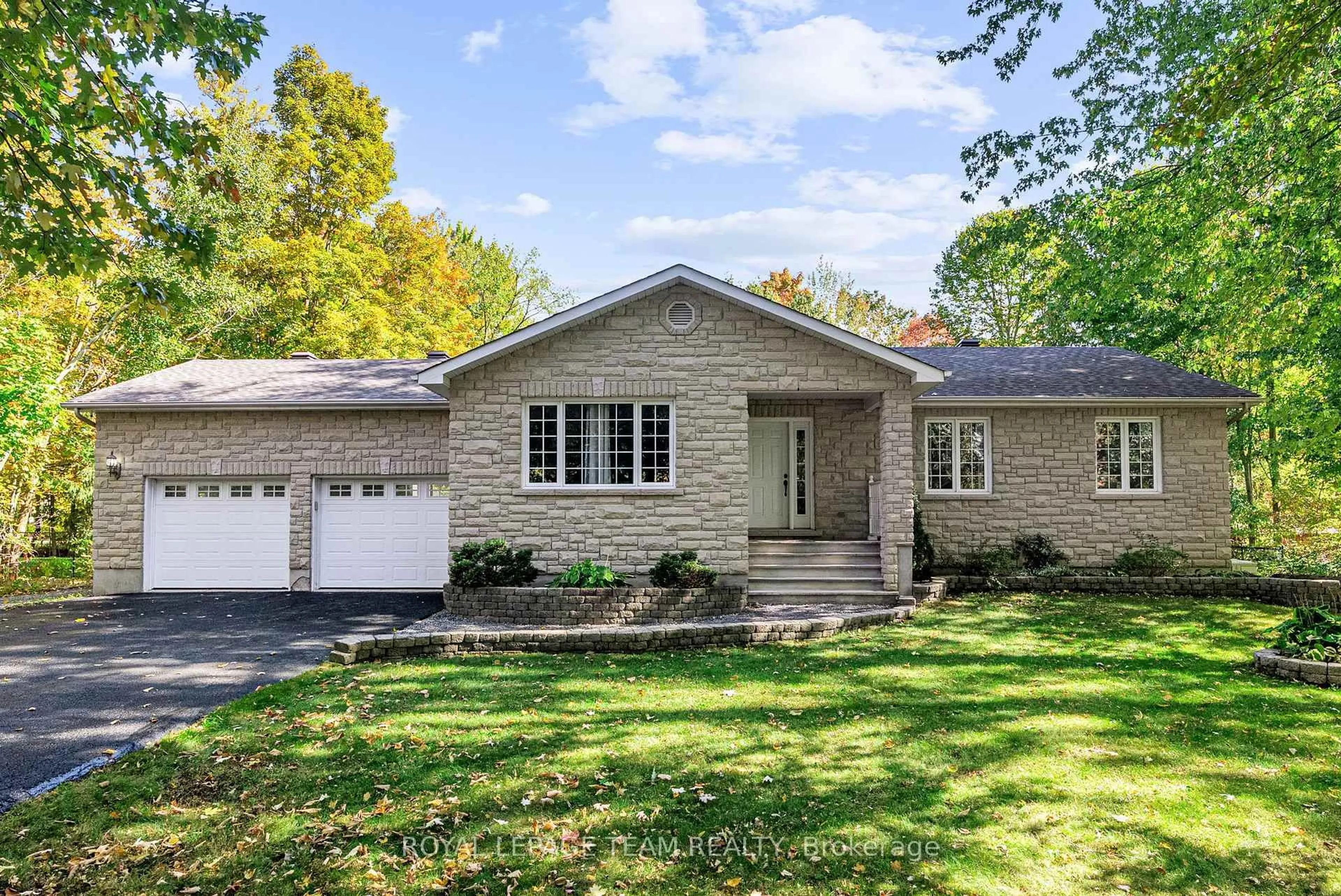 Home with brick exterior material, street for 3309 Wild Cherry Dr, Osgoode Ontario K0A 2W0
