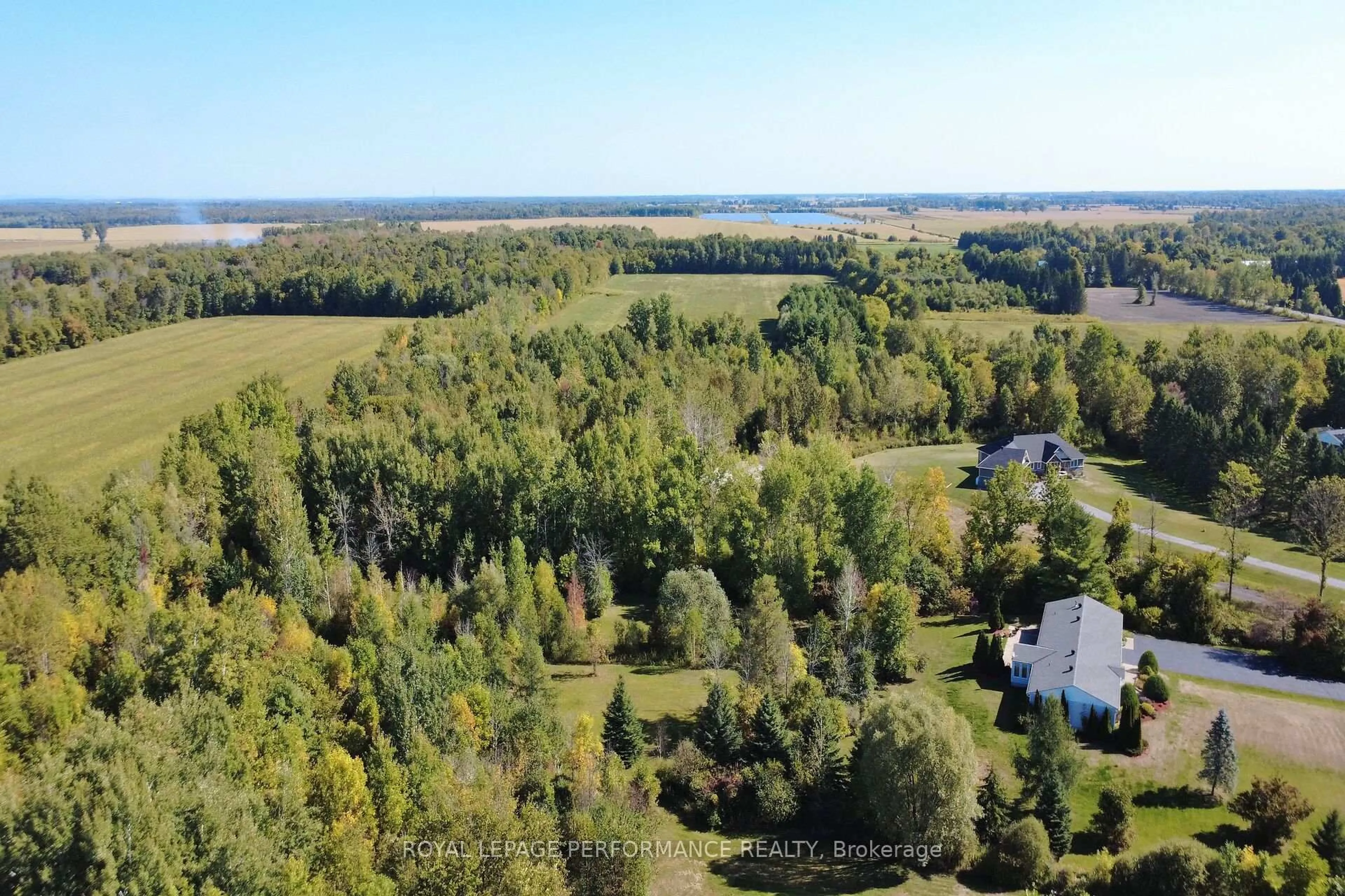 A pic from outside/outdoor area/front of a property/back of a property/a pic from drone, water/lake/river/ocean view for 8329 Rodney Farm Dr, Metcalfe Ontario K0A 2P0