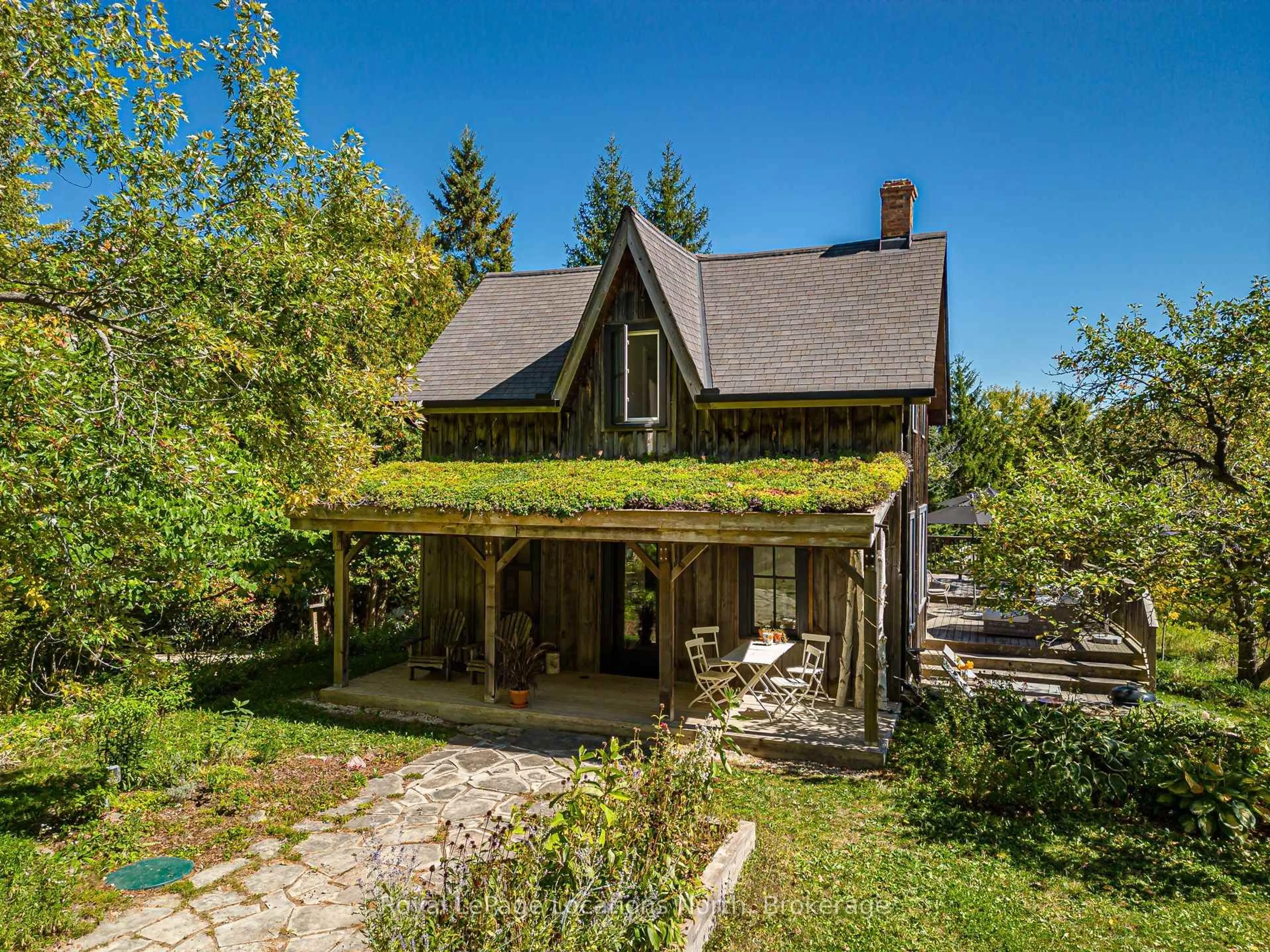 A pic from outside/outdoor area/front of a property/back of a property/a pic from drone, unknown for 758153 2nd Line, Mulmur Ontario L0M 1M0