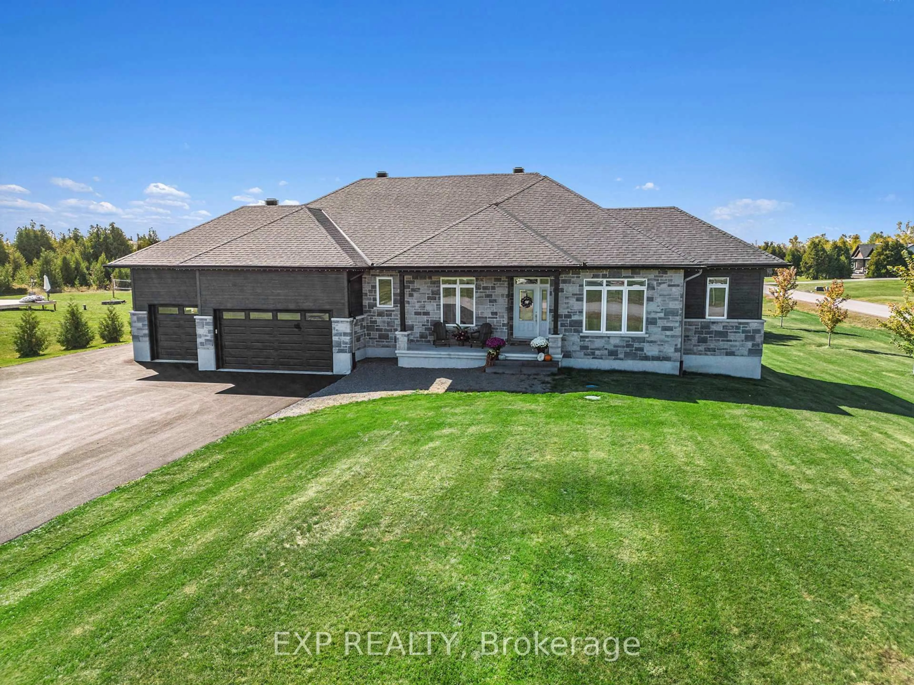 A pic from outside/outdoor area/front of a property/back of a property/a pic from drone, unknown for 145 Harold Jones Way, Ashton Ontario K0A 1B0