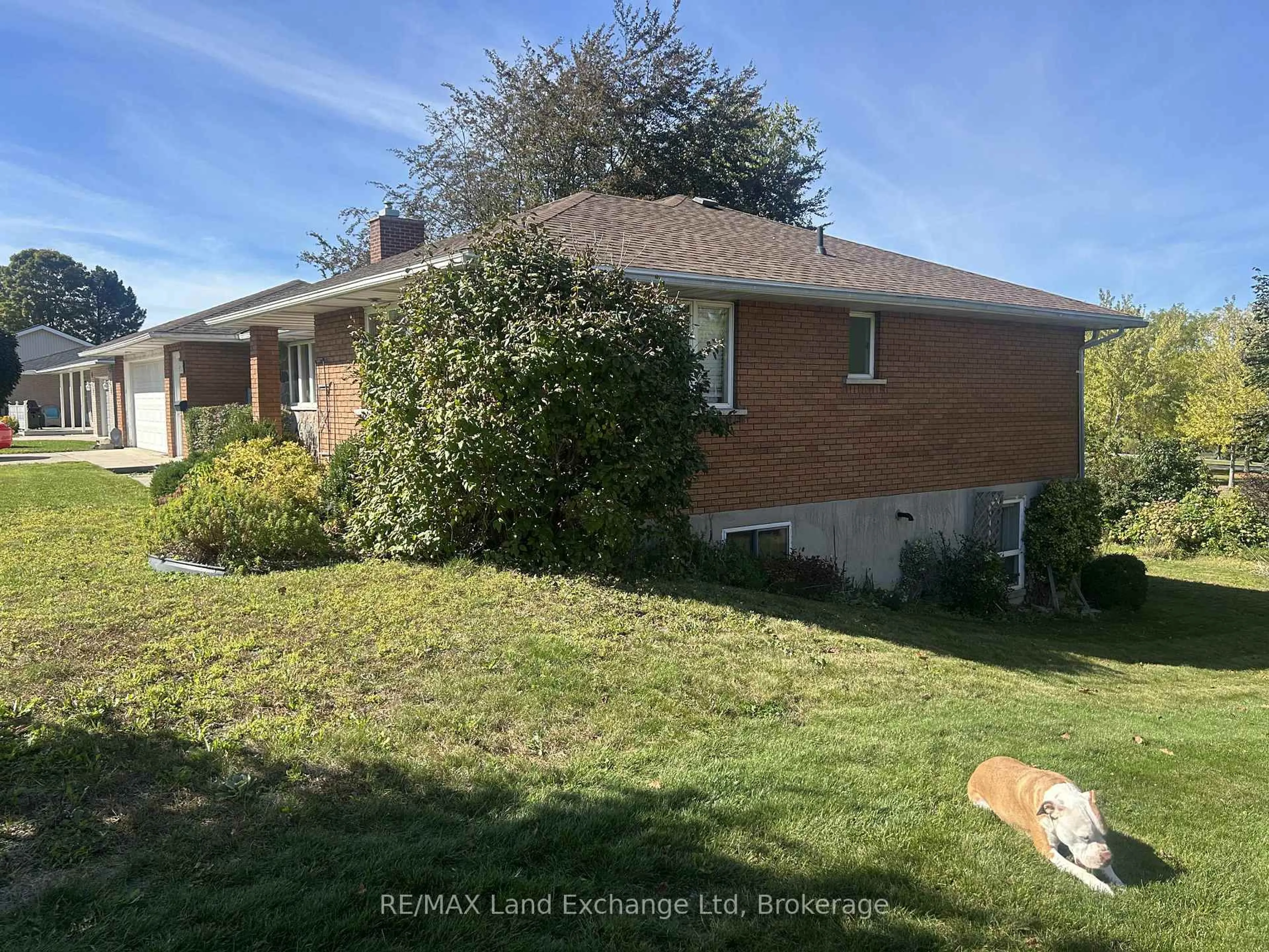 A pic from outside/outdoor area/front of a property/back of a property/a pic from drone, unknown for 38 Hillcrest St, South Bruce Ontario N0G 2S0