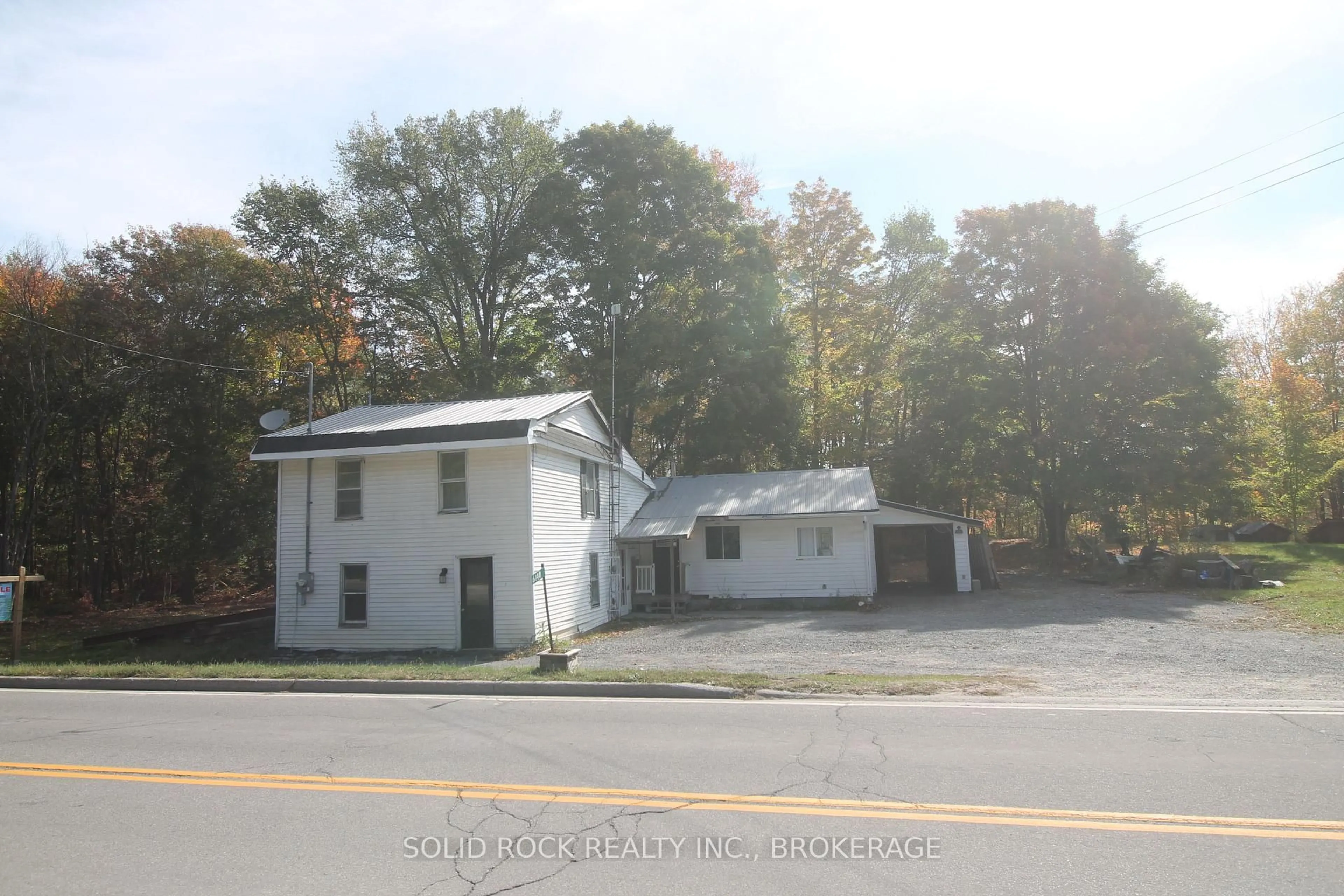 A pic from outside/outdoor area/front of a property/back of a property/a pic from drone, unknown for 6140 Perth Rd, Perth Road Ontario K0H 2L0