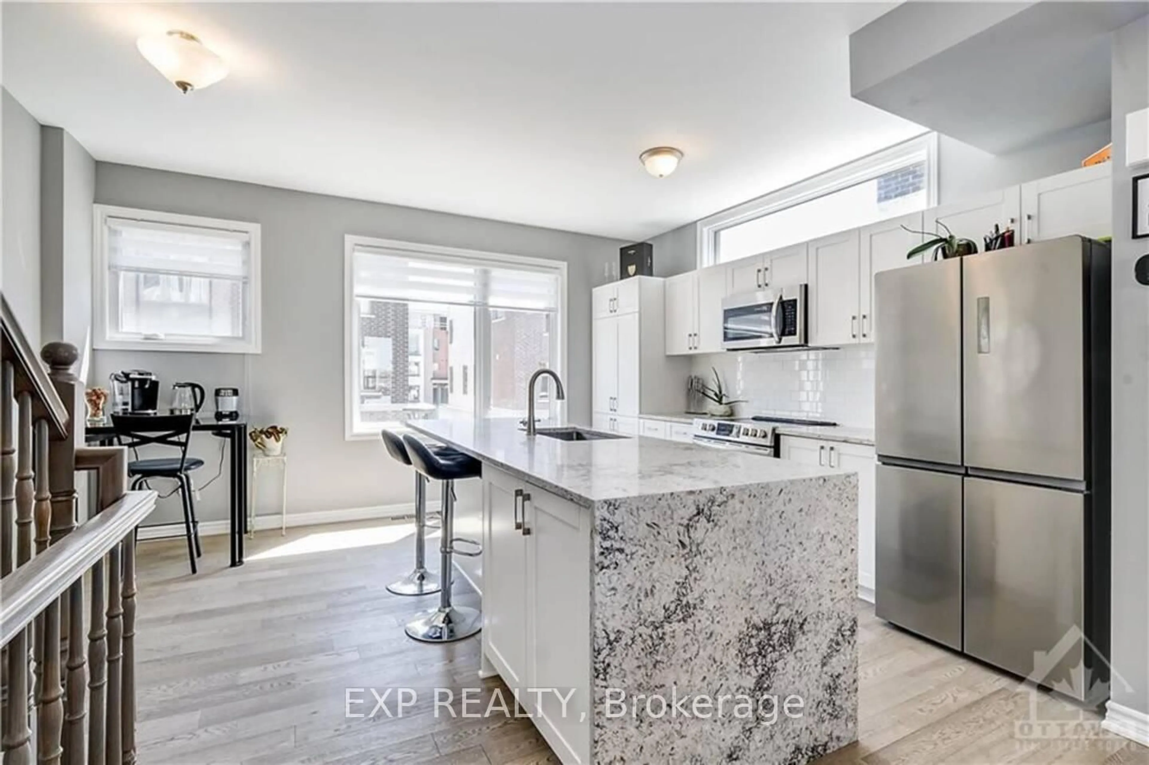 Open concept kitchen, ceramic/tile floor for 213 Makadewa Private, Ottawa Ontario K1K 4Z8