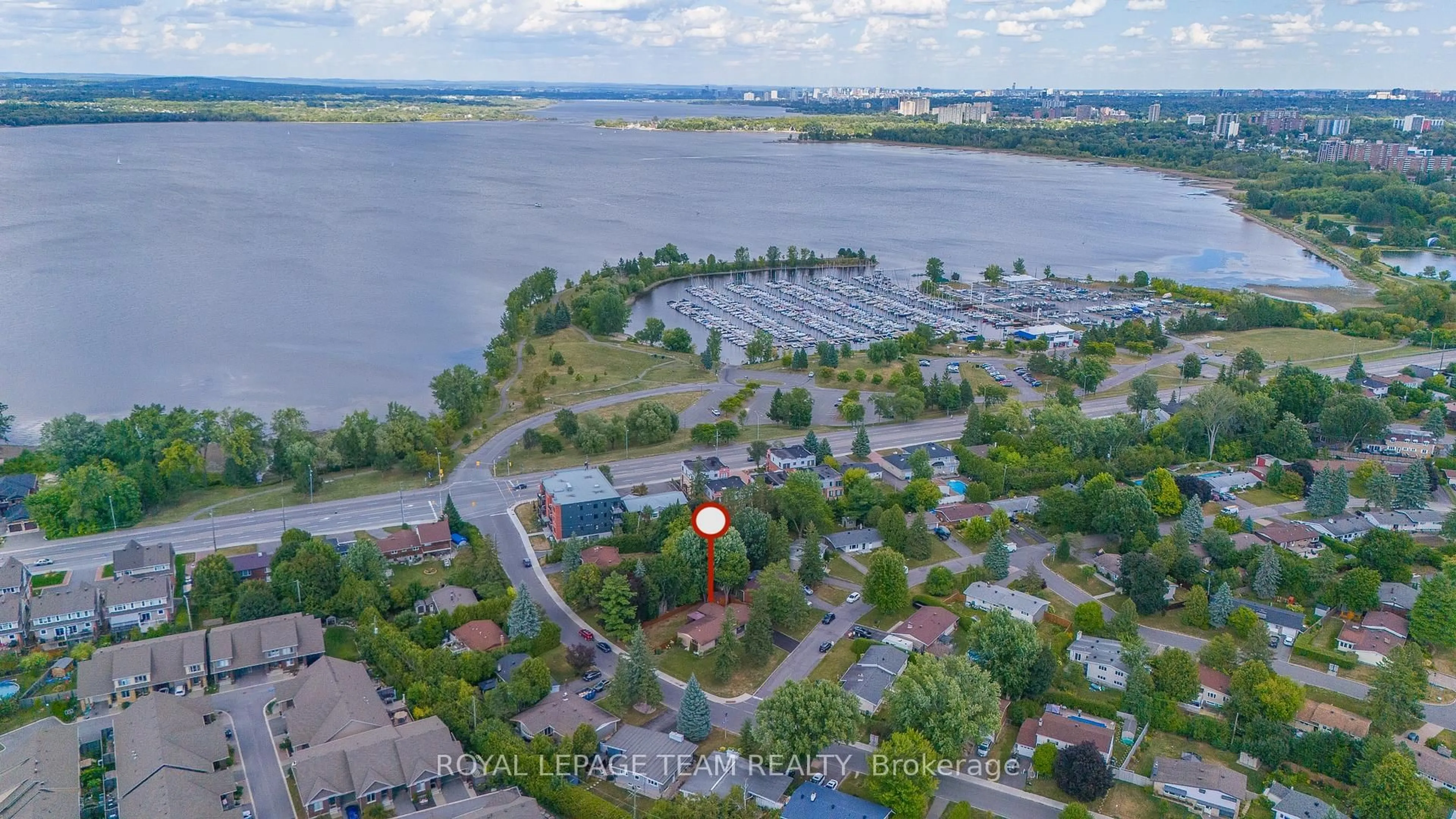 A pic from outside/outdoor area/front of a property/back of a property/a pic from drone, water/lake/river/ocean view for 1 Stillwater Dr, Ottawa Ontario K2H 5J9
