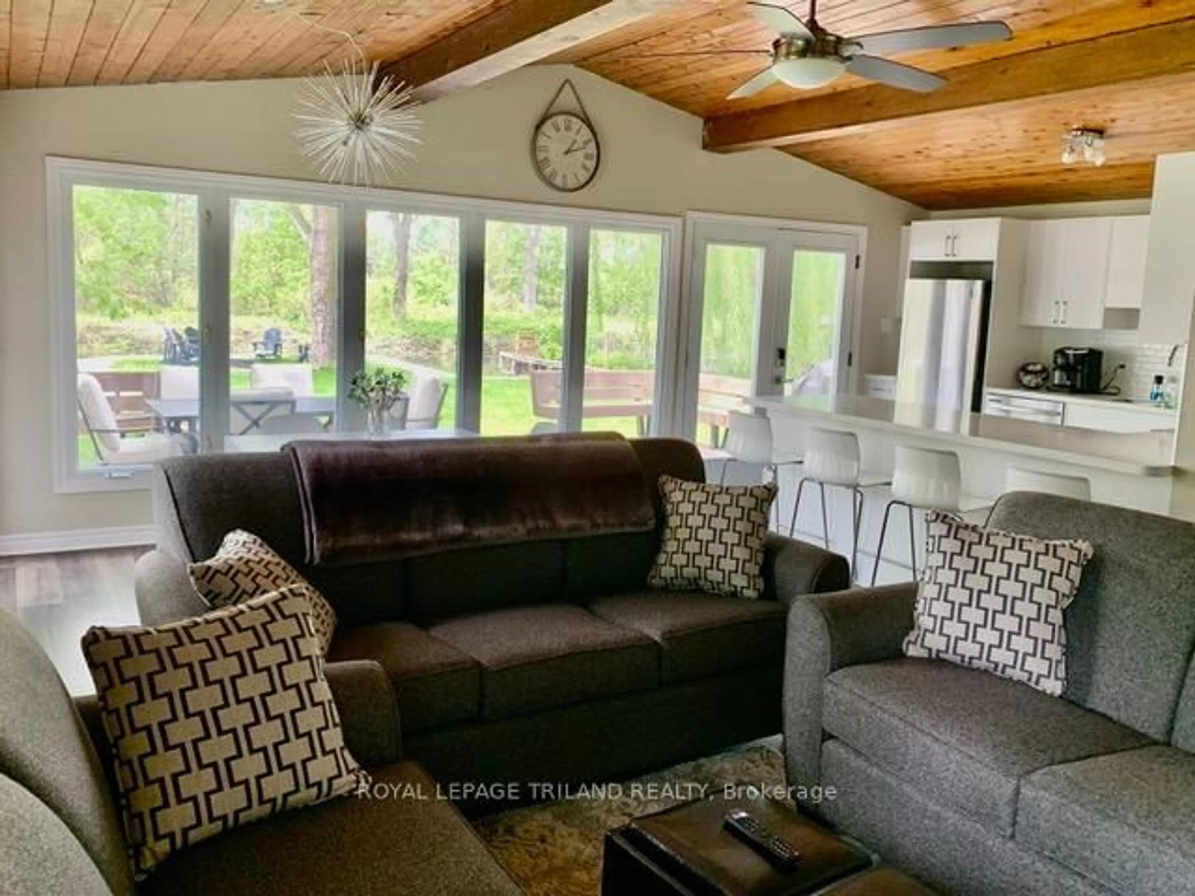 Living room with furniture, wood/laminate floor for 16 Howey Ave, Norfolk Ontario N0E 1M0