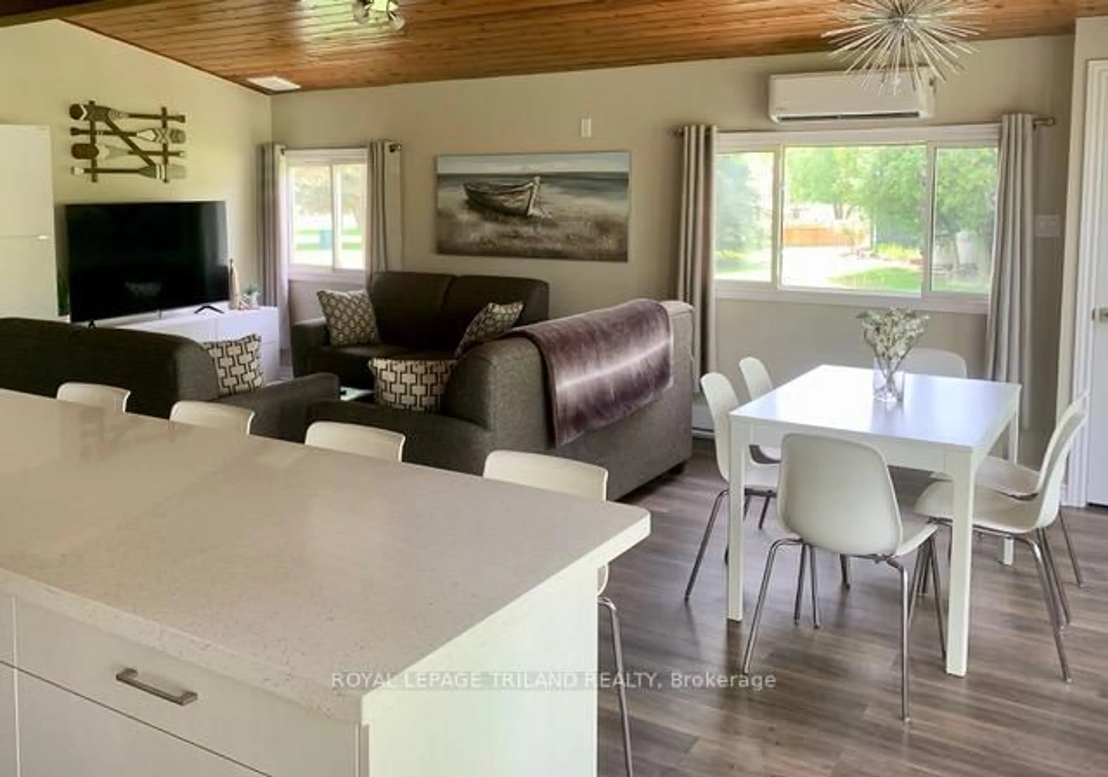 Open concept kitchen, wood/laminate floor for 16 Howey Ave, Norfolk Ontario N0E 1M0