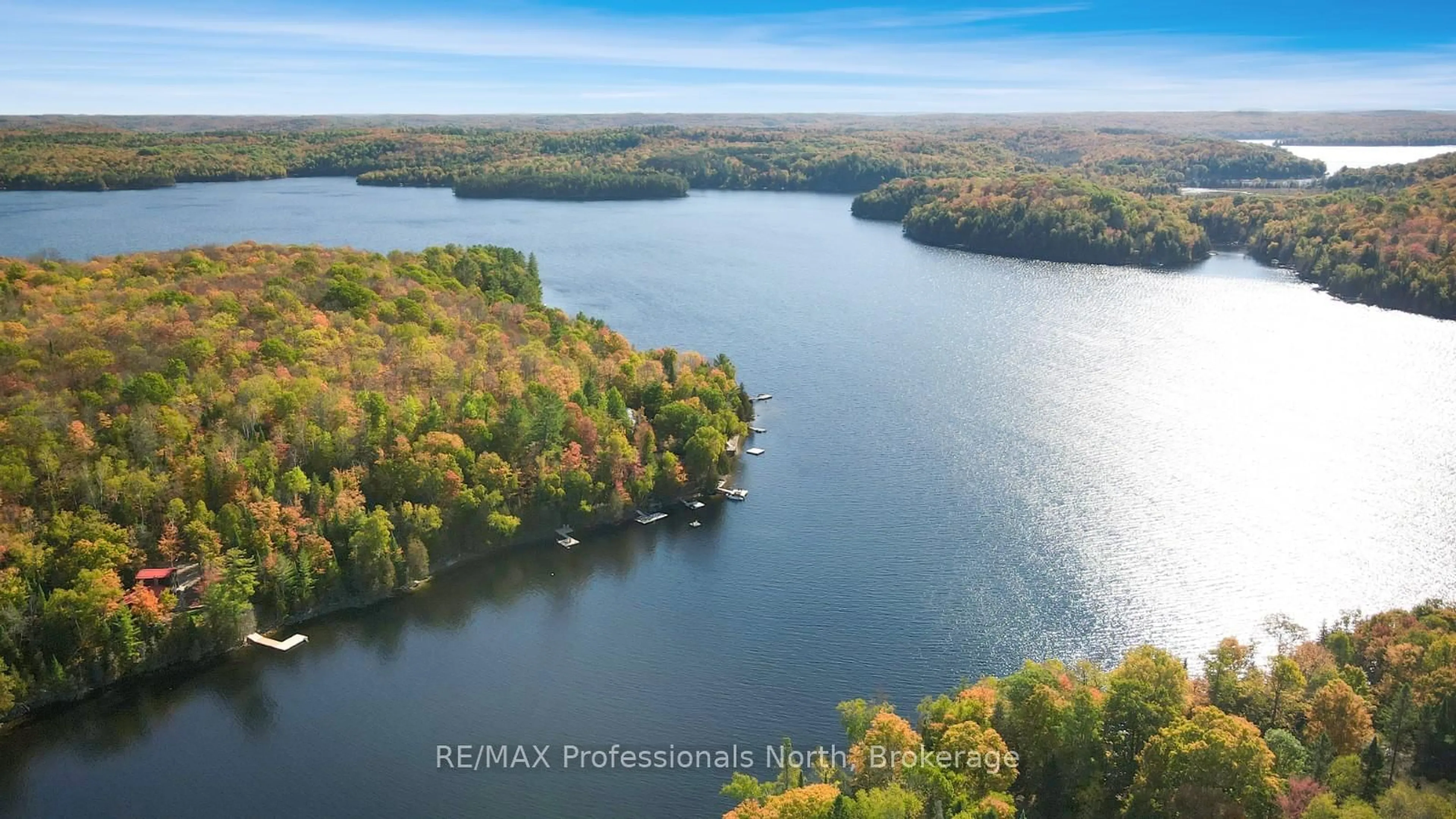 A pic from outside/outdoor area/front of a property/back of a property/a pic from drone, water/lake/river/ocean view for 1005 Osgoode Rd, Minden Hills Ontario K0M 2K0