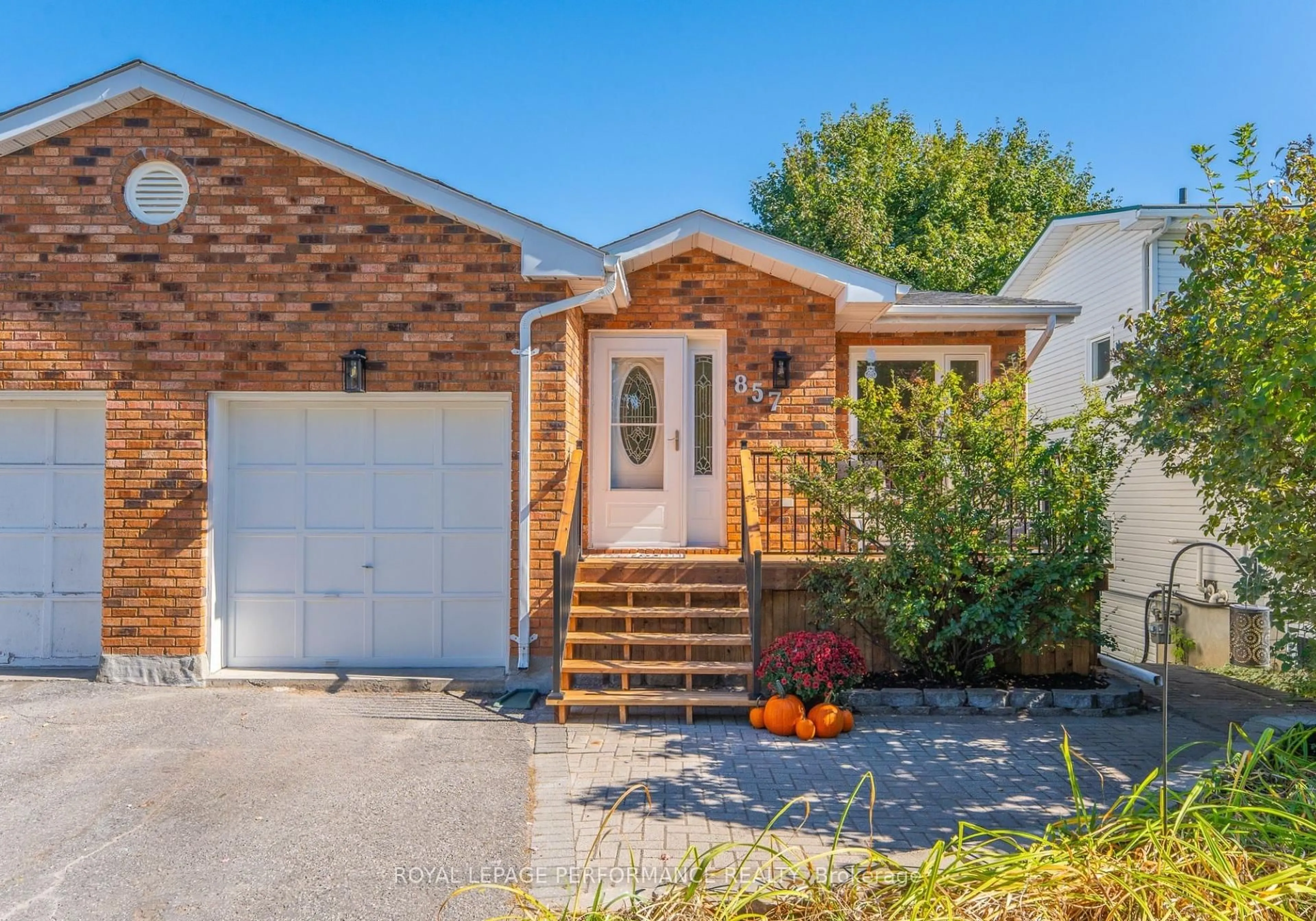 Home with brick exterior material, street for 857 Rob Roy Ave, Ottawa Ontario K2B 8S6