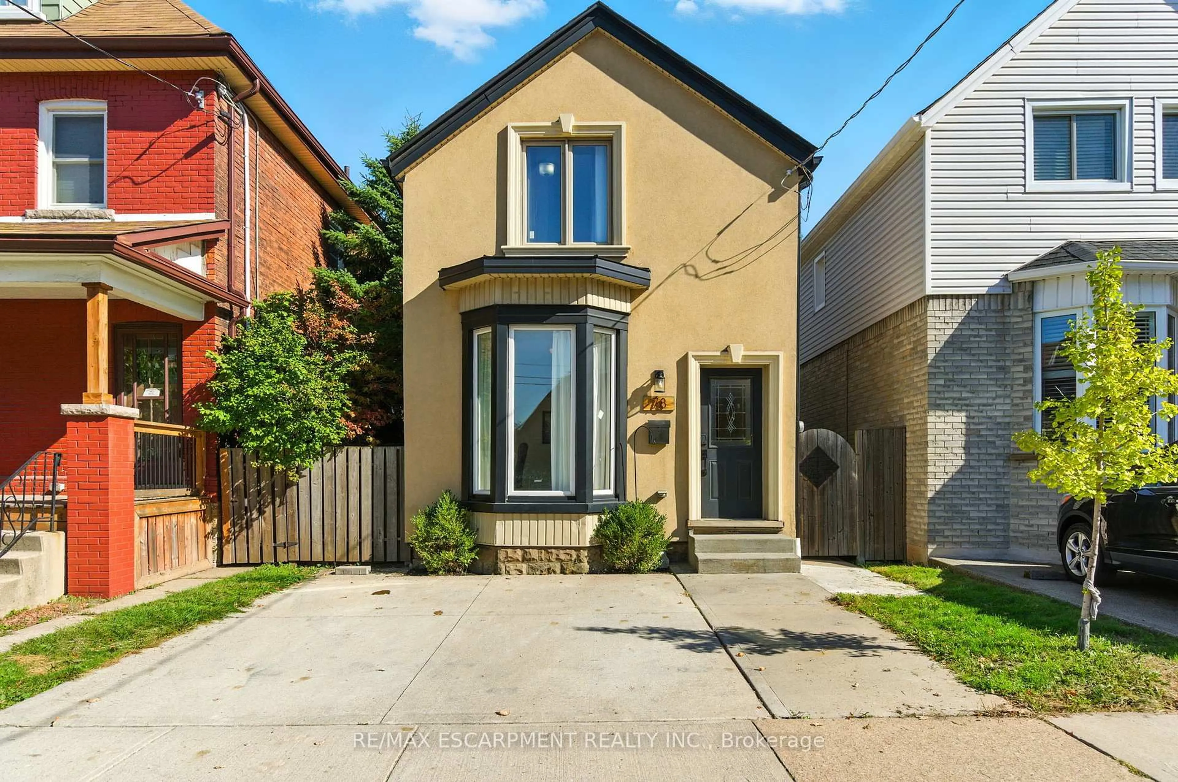 Home with brick exterior material, street for 78 OAK Ave, Hamilton Ontario L8L 5M8