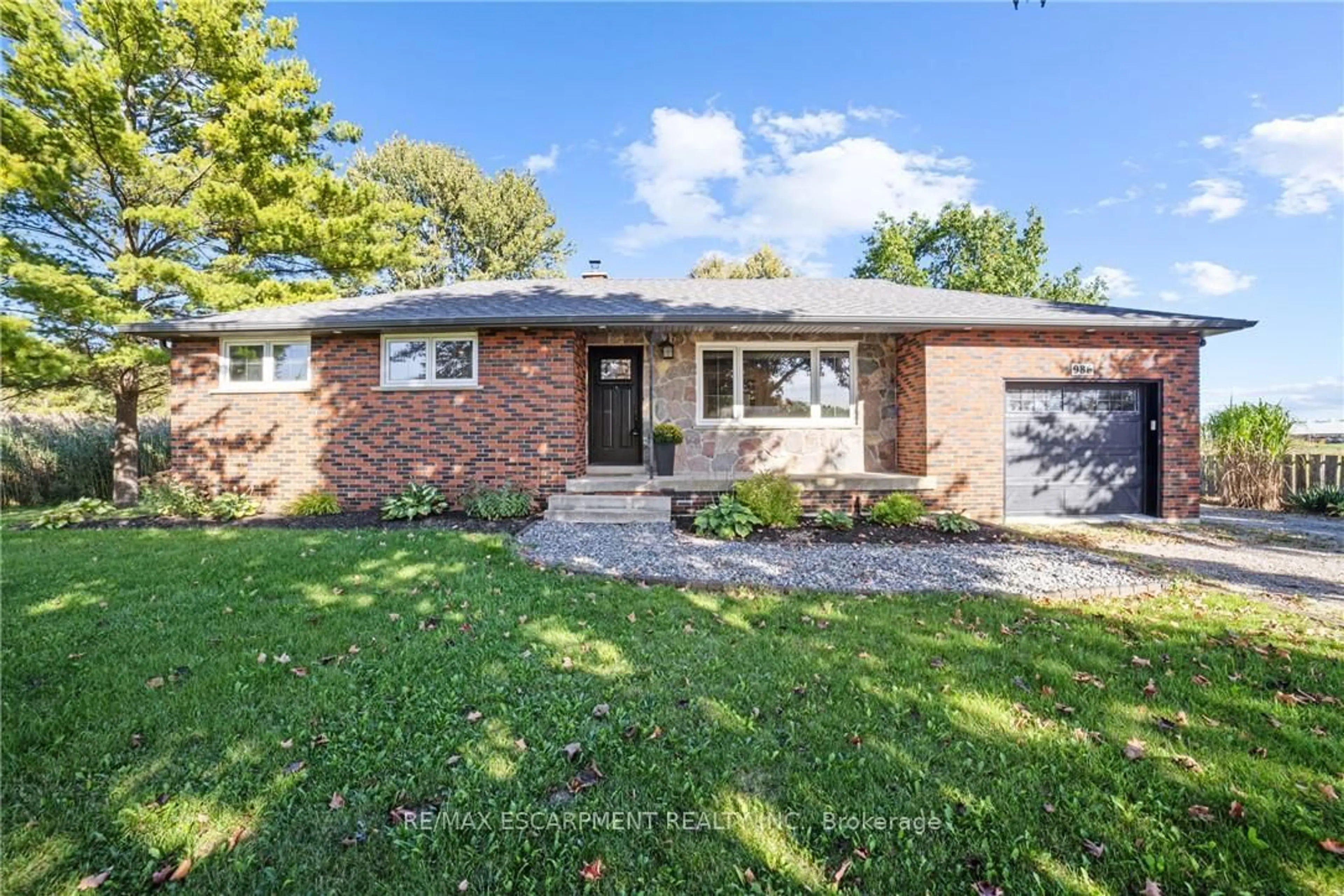 Home with brick exterior material, street for 986 Westover Rd, Hamilton Ontario N0B 1L0