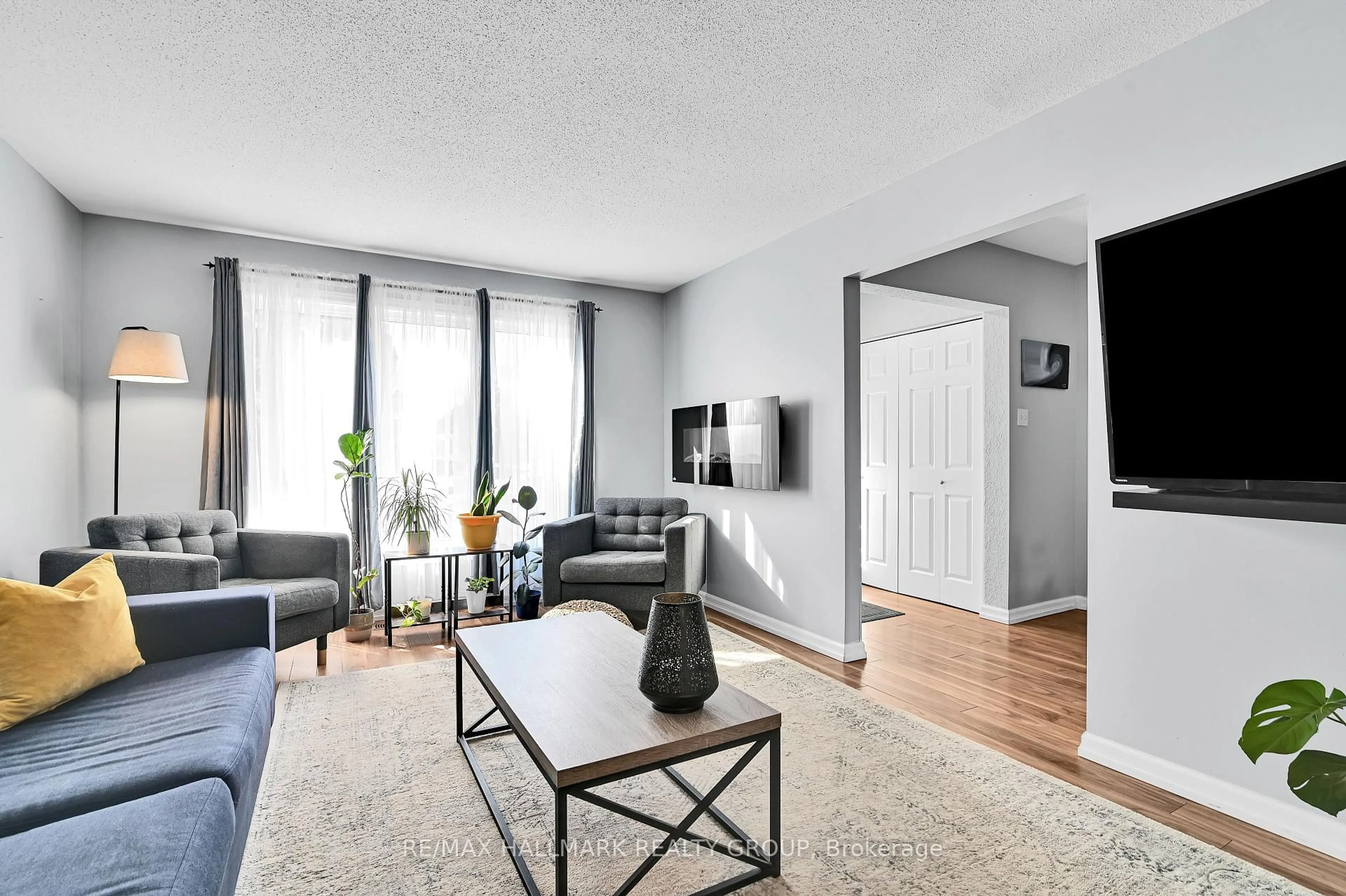 Living room with furniture, unknown for 21 Midland Cres #53, Ottawa Ontario K2H 8P6