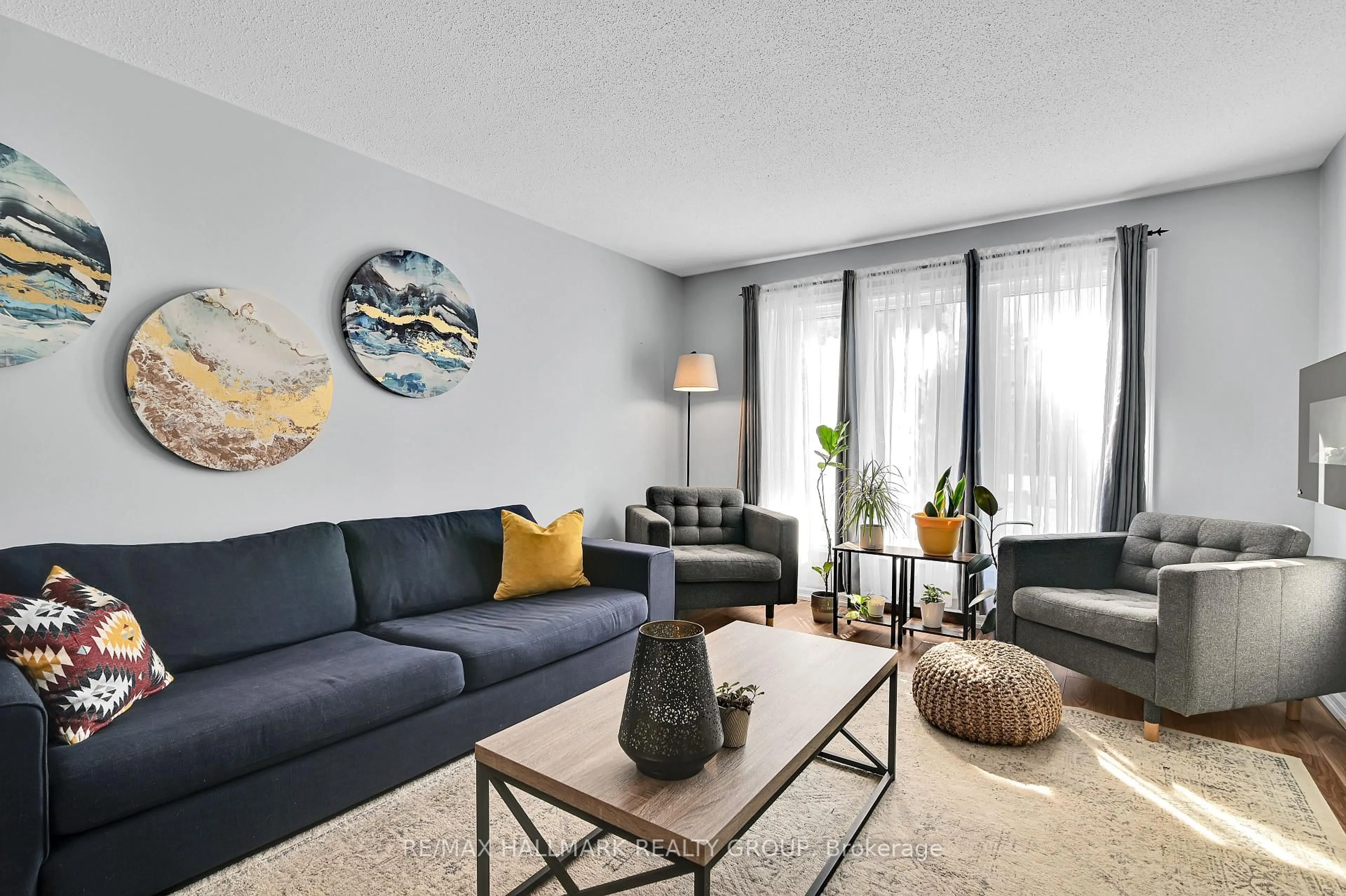 Living room with furniture, unknown for 21 Midland Cres #53, Ottawa Ontario K2H 8P6
