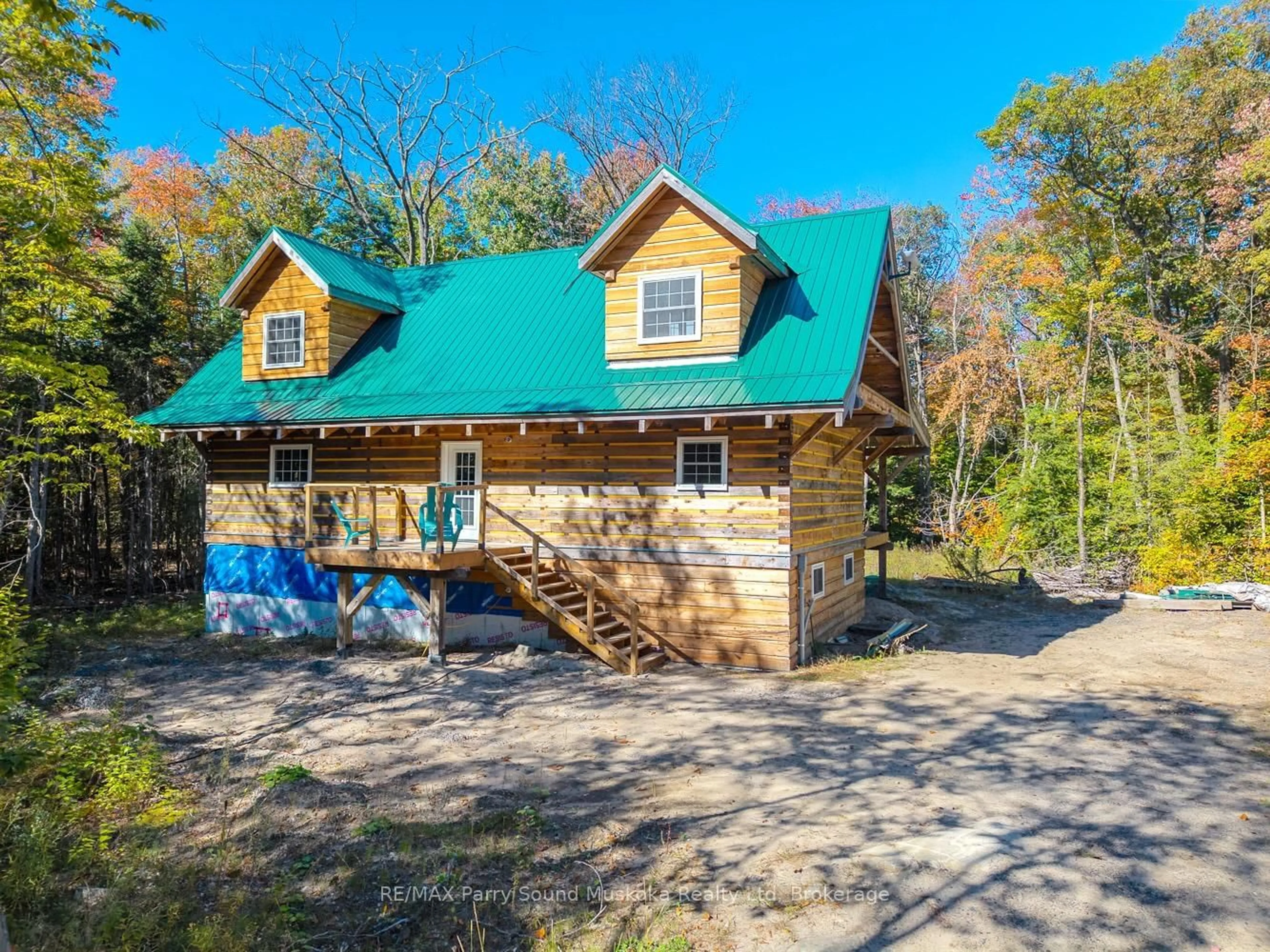 A pic from outside/outdoor area/front of a property/back of a property/a pic from drone, unknown for 67 Hwy 141 Highway, Seguin Ontario P2A 2W8