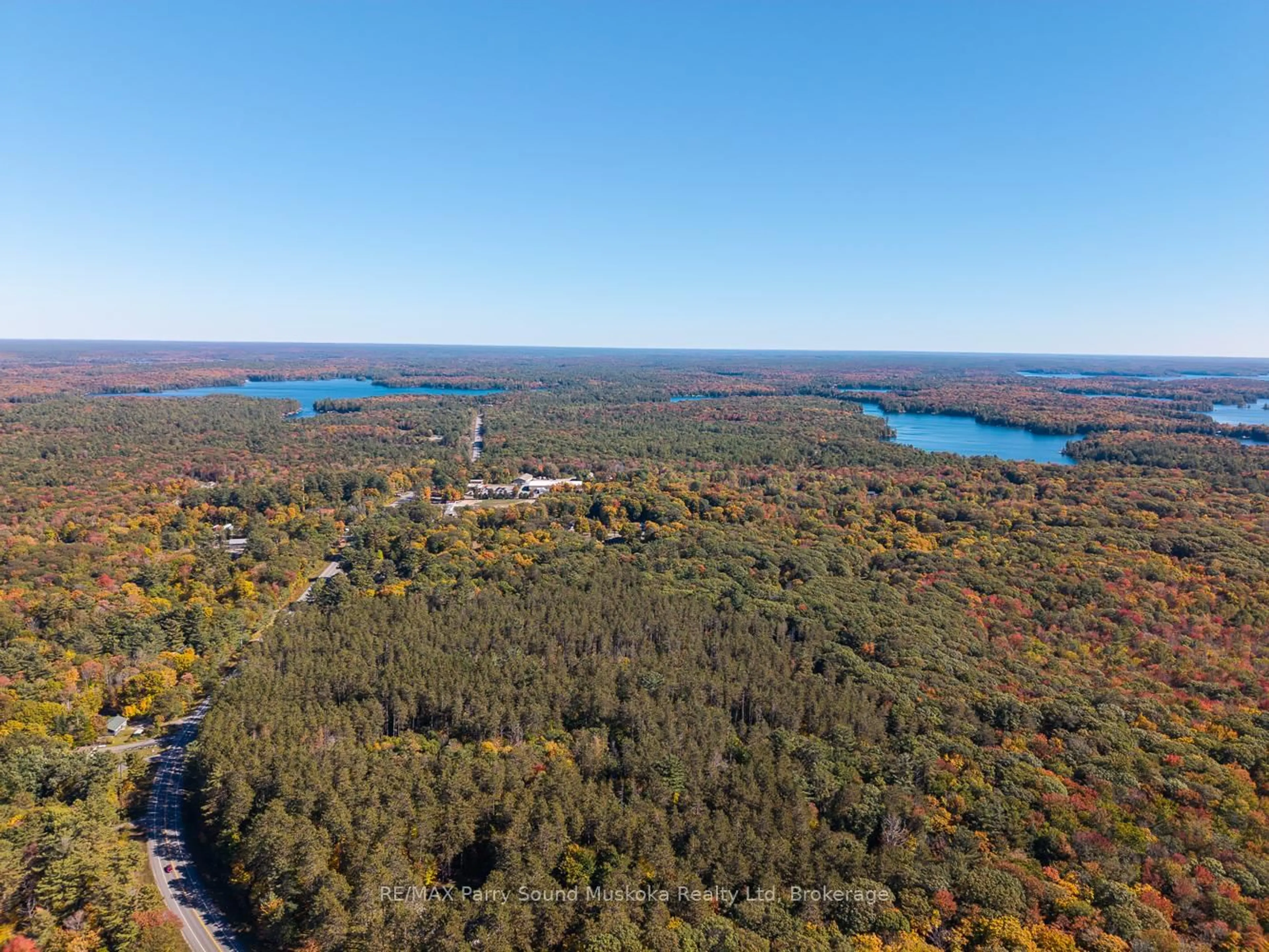 A pic from outside/outdoor area/front of a property/back of a property/a pic from drone, forest/trees view for 67 Hwy 141 Highway, Seguin Ontario P2A 2W8