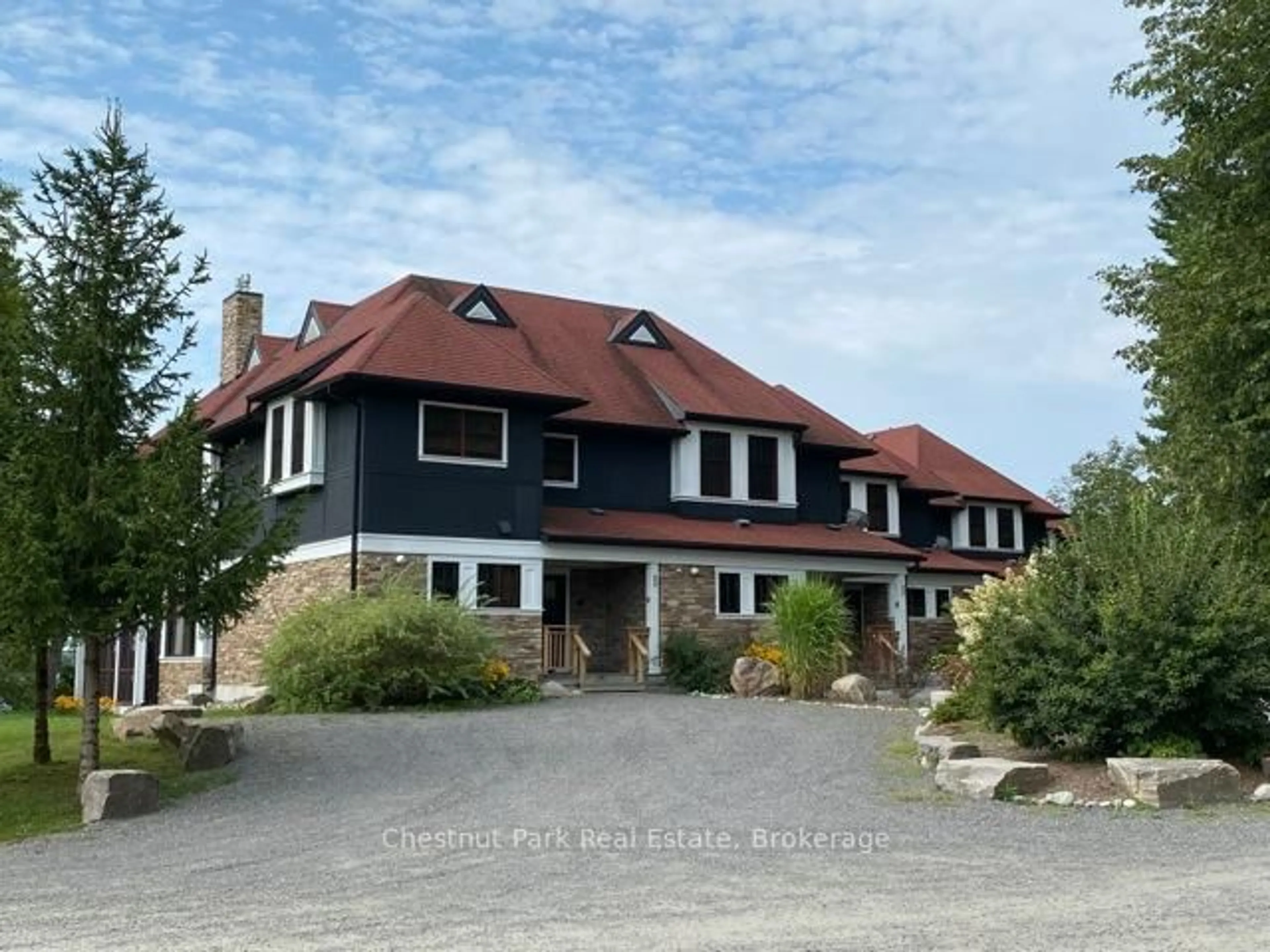 A pic from outside/outdoor area/front of a property/back of a property/a pic from drone, unknown for 1003 MATTHEWS Dr #C5 12SA, Muskoka Lakes Ontario P0B 1P0