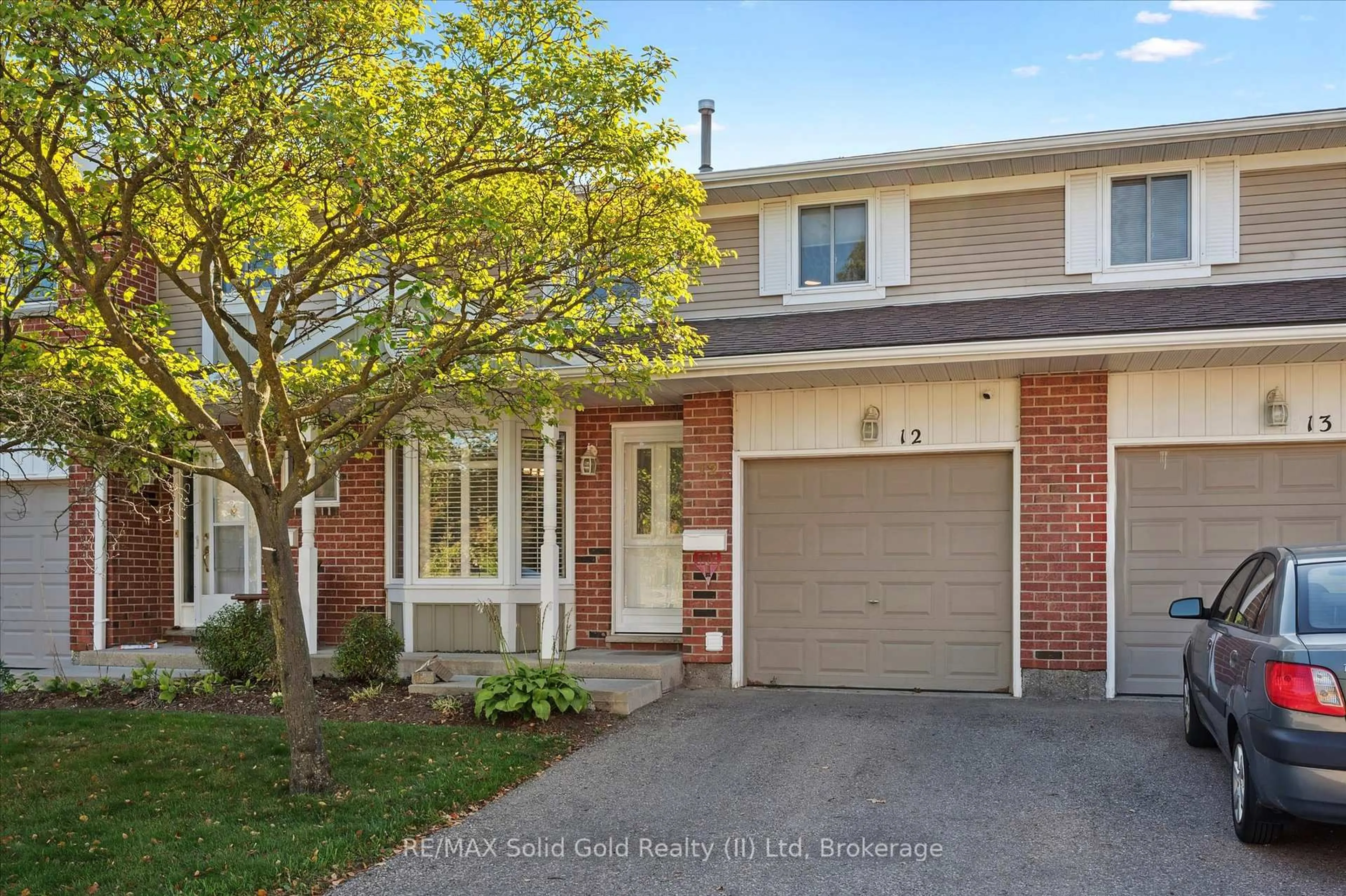 Home with brick exterior material, street for 210 Highland Cres #12, Kitchener Ontario N2M 5H7