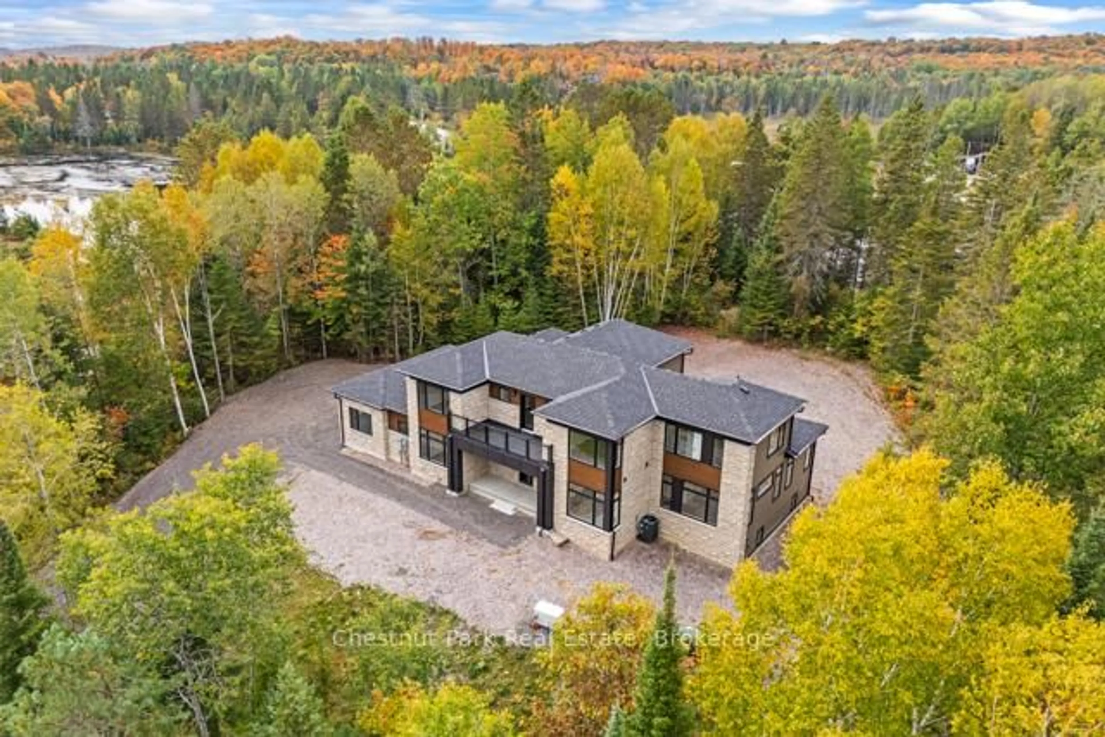 A pic from outside/outdoor area/front of a property/back of a property/a pic from drone, forest/trees view for 1019 Pondview Crt #87, Lake of Bays Ontario P1H 2J6