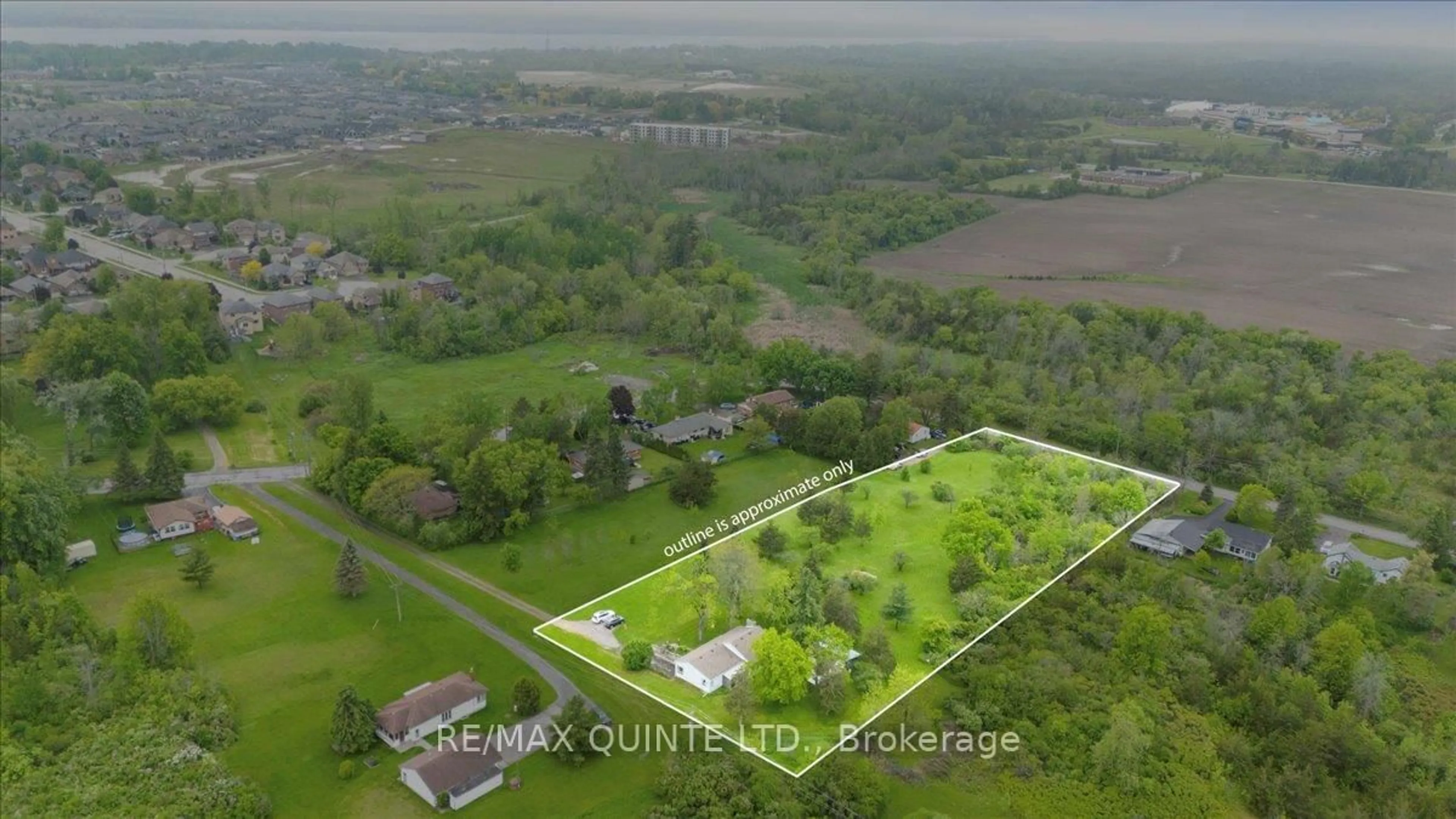 A pic from outside/outdoor area/front of a property/back of a property/a pic from drone, water/lake/river/ocean view for 404 Bridge St, Belleville Ontario K8N 4Z2