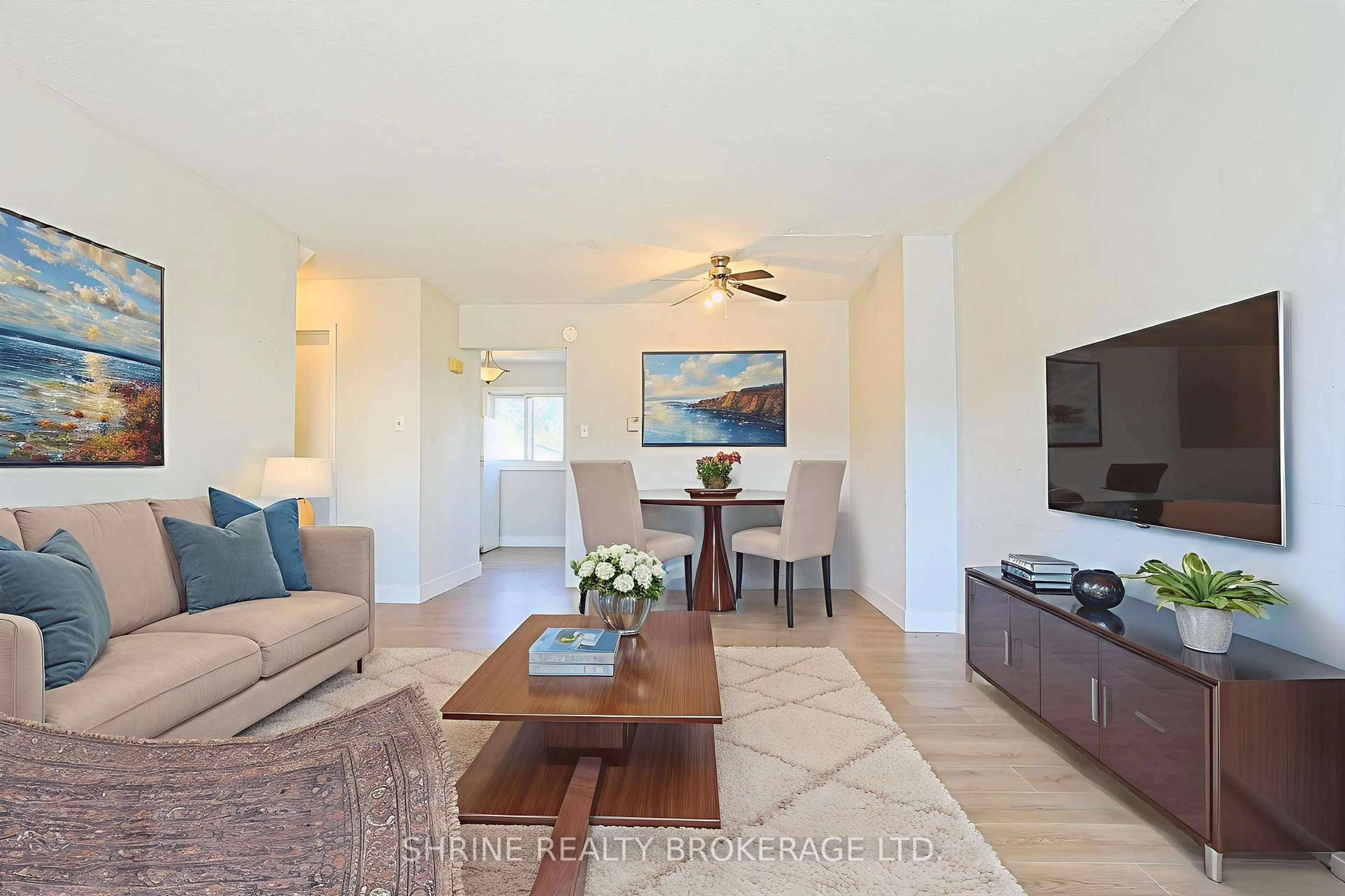 Living room with furniture, wood/laminate floor for 577 THIRD St #22, London East Ontario N5V 4B8